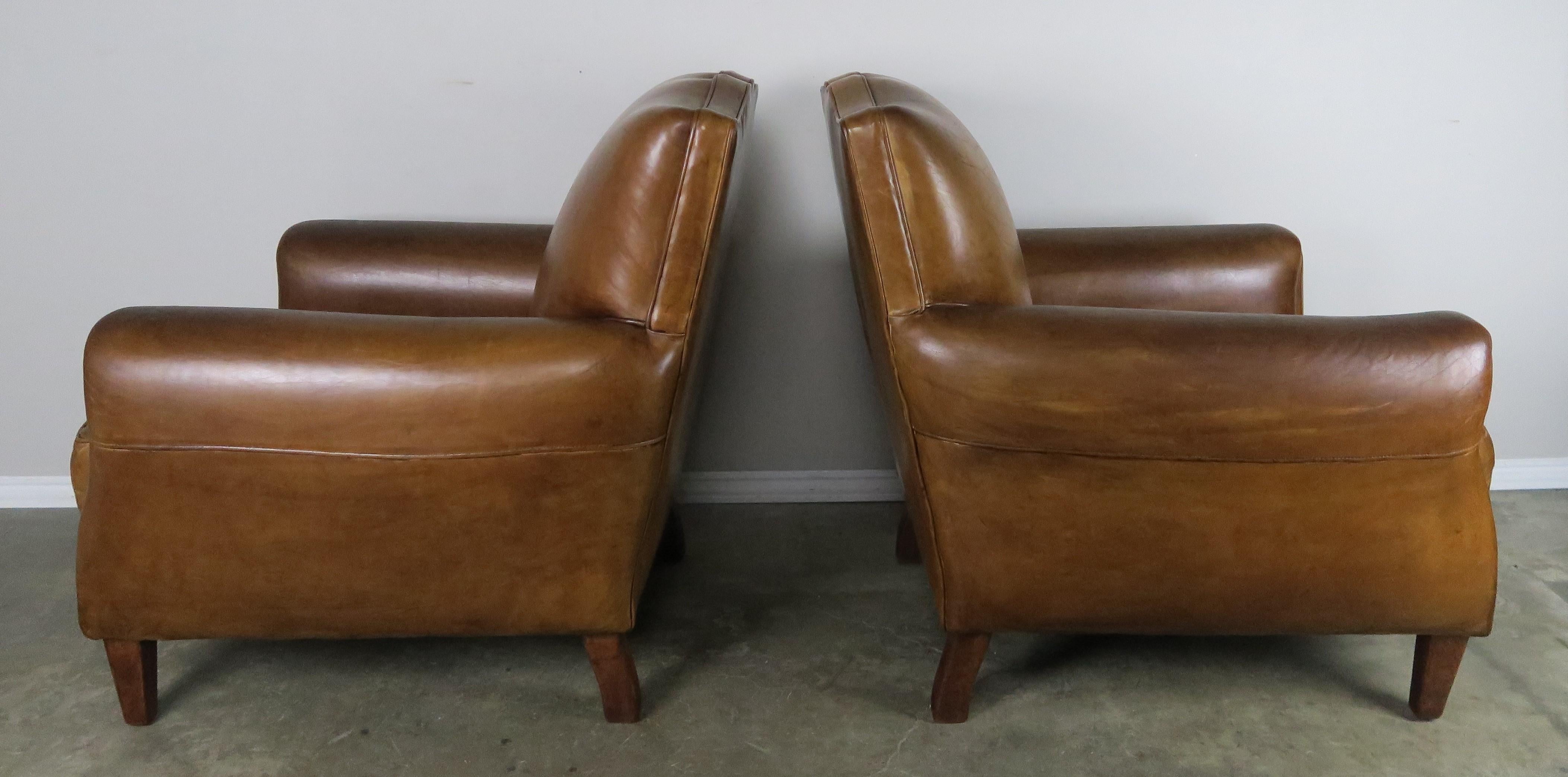 French Deco Style Mustache Shaped Leather Armchairs, circa 1930s, Pair In Distressed Condition In Los Angeles, CA