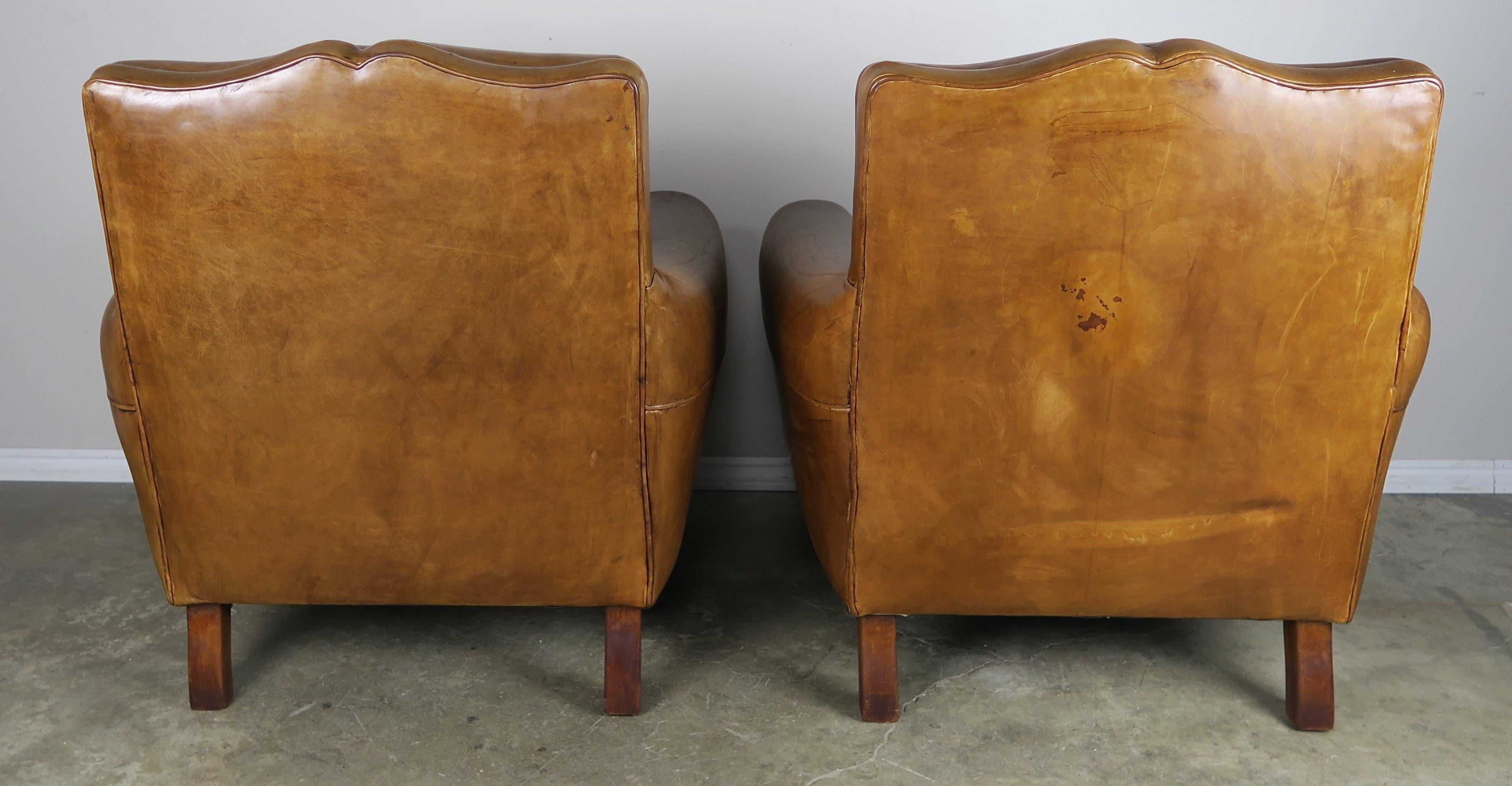 Mid-20th Century French Deco Style Mustache Shaped Leather Armchairs, circa 1930s, Pair