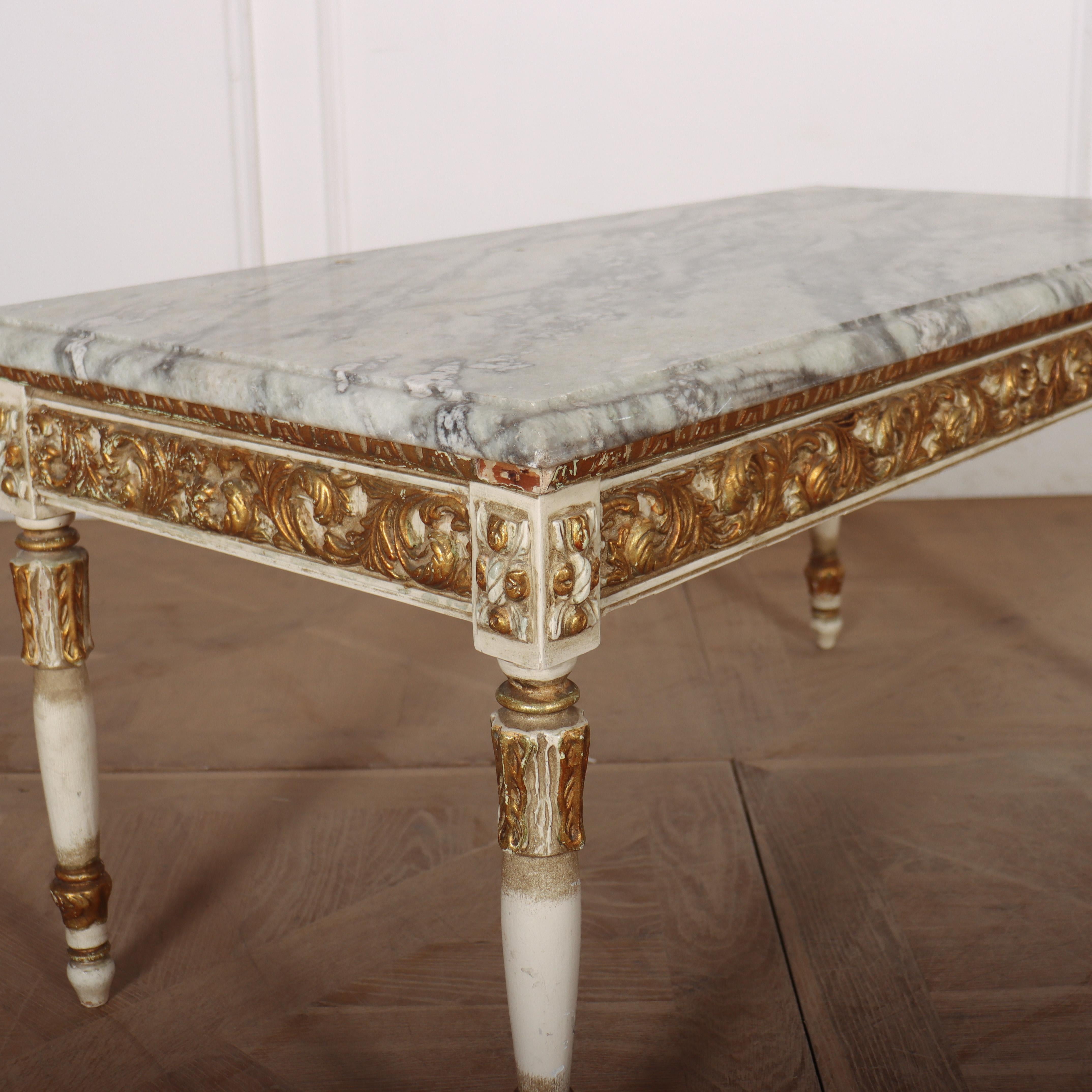 1920's French decorated marble topped coffee table.

Code: 9127

Dimensions:
W: 41
