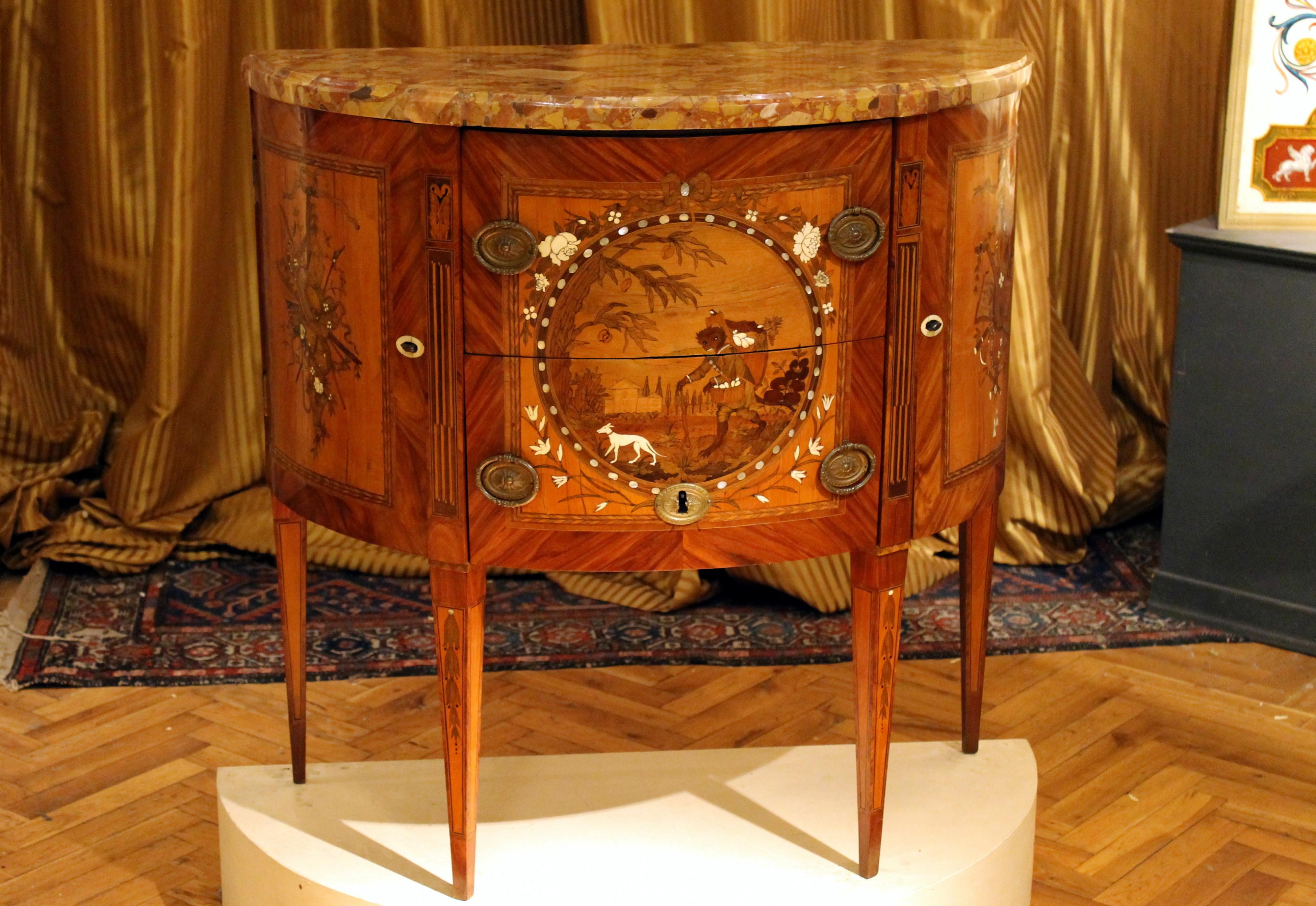 This wonderful French 18th century demilune (half moon) shaped sideboard or chest of drawers dating back to Louis XVI period (1774 -1791) -stamped by the French cabinet maker Tondeur- features great scale, perfect proportions and stunning high