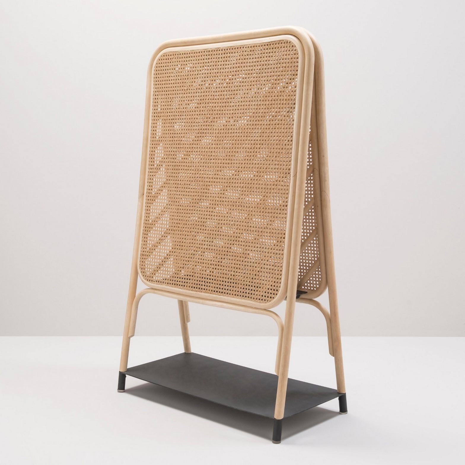 Magnificent screen, French design and work of a great fineness in natural rattan, wicker cane and metal. Perfect for room separation, it will also take place in your entrance due to the low and middle black metal storage shelves where you can put