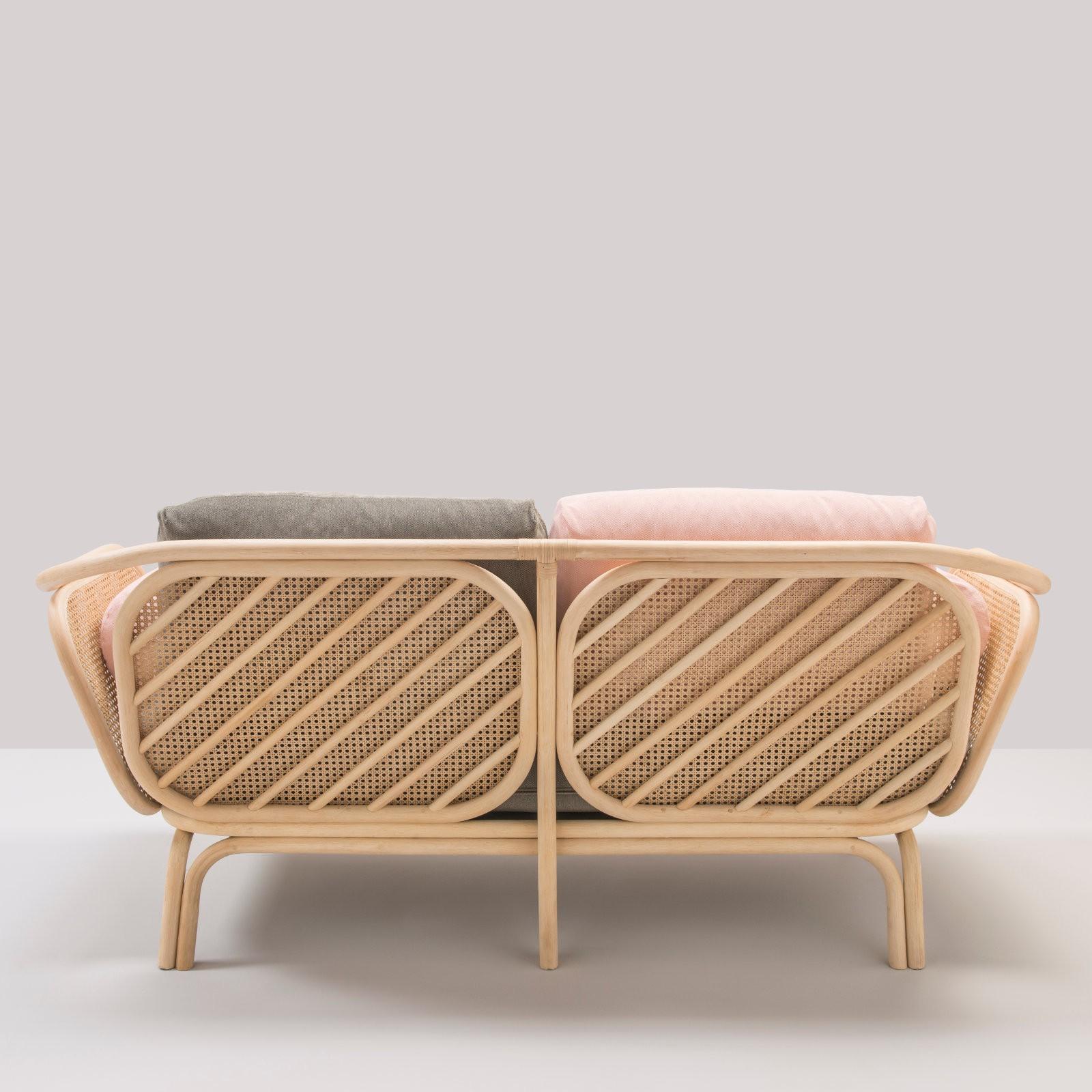 Timeless and airy lines, trendy and graphic design for this French sofa composed of a robust rattan structure decorated with caned windows and gorgeous fabric (new item, never used).