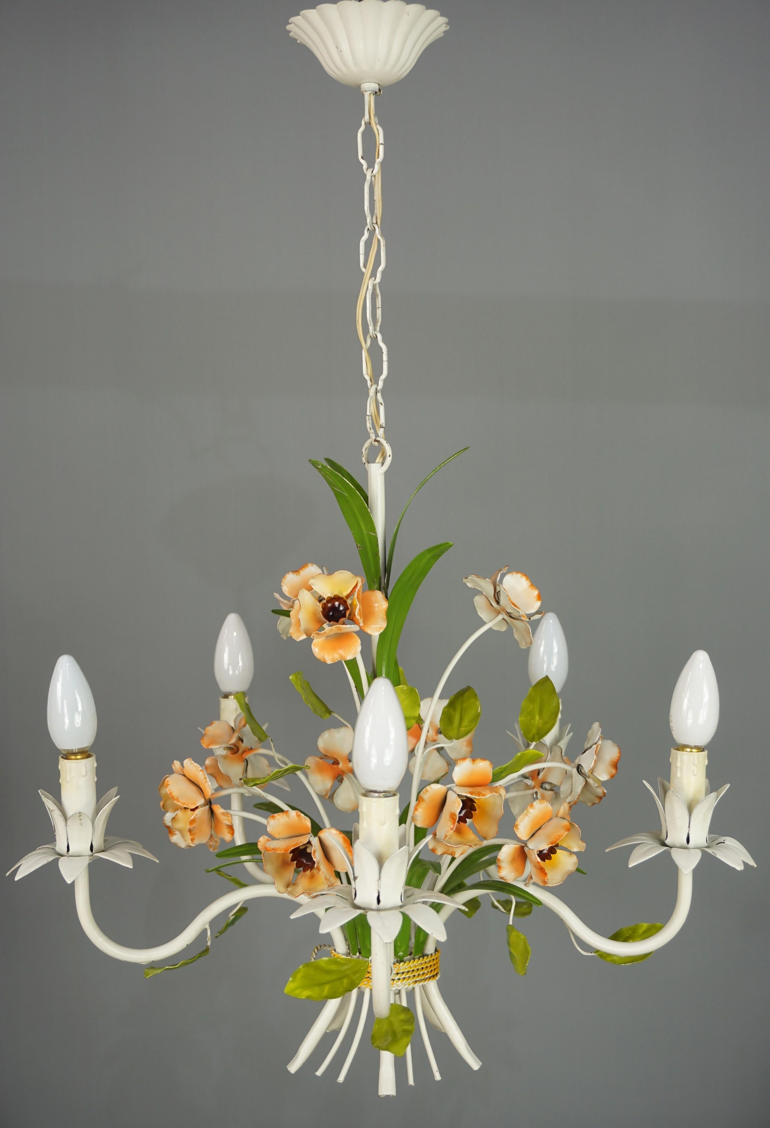 French design wrought iron chandelier bucolic and springtime.