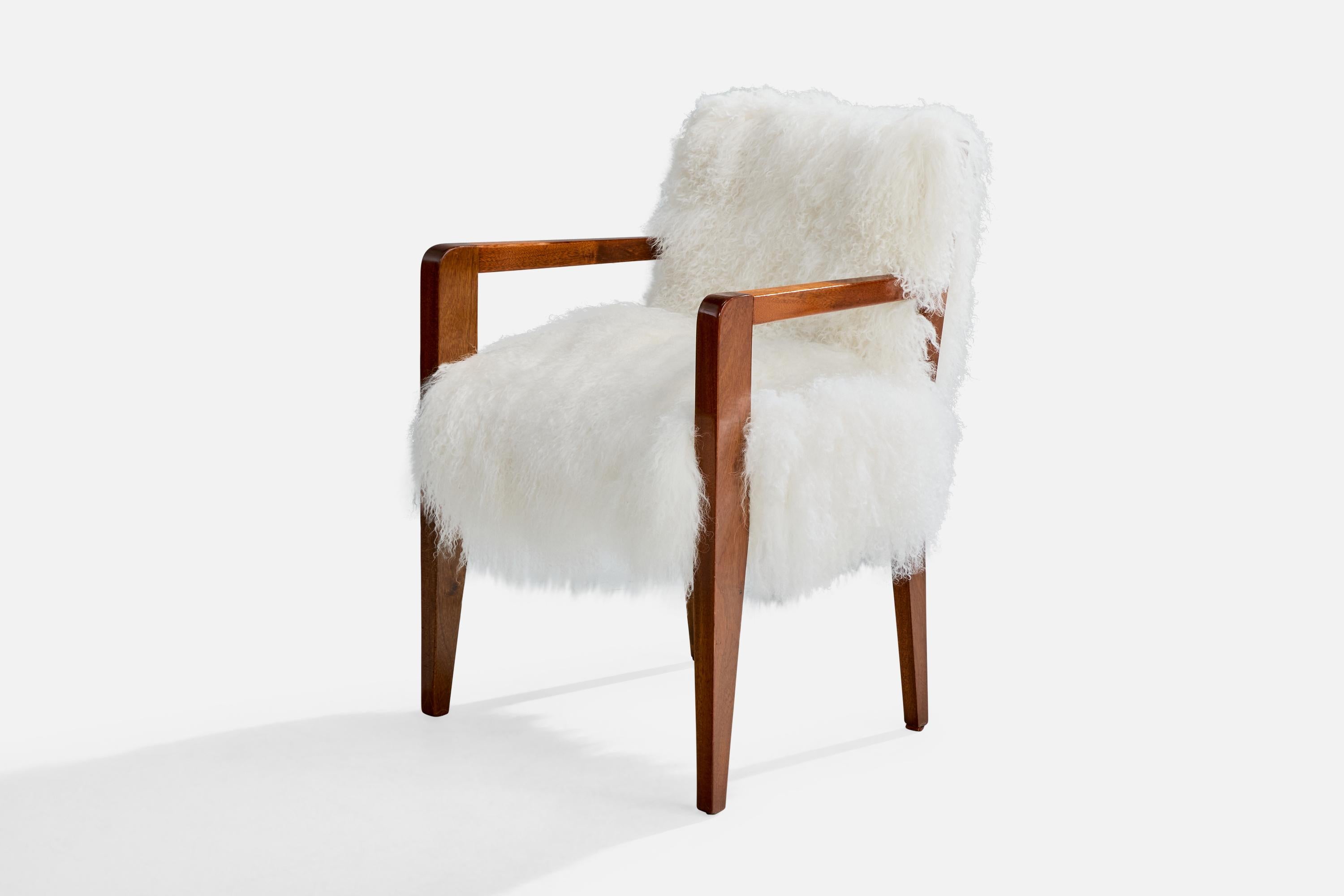A stained wood and white shearling armchair or side chair designed and produced in France, c. 1930s.

Overall Dimensions (inches): 32.5