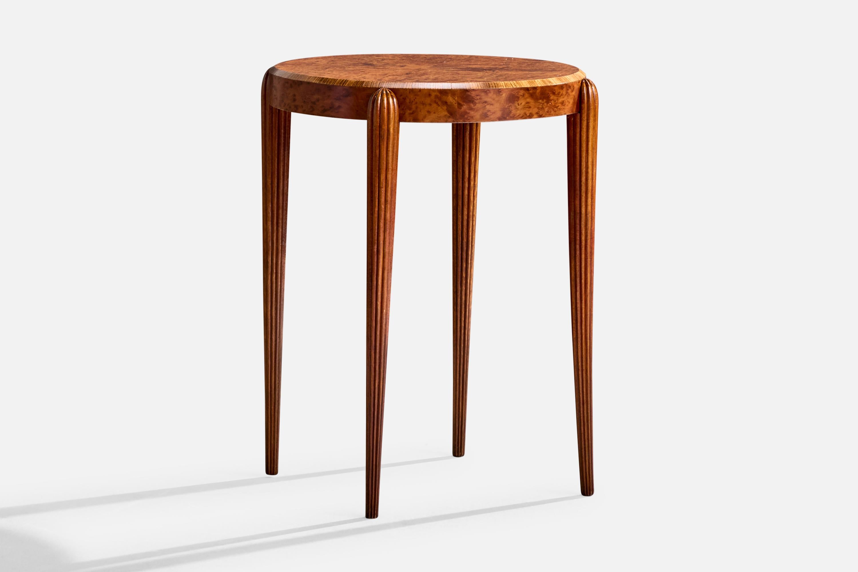 A cedar burl wood side table or guéridon likely designed and produced in France, c. 1920s.

Ripples to veneer on tabletop.

Overall Dimensions (inches): 29.0