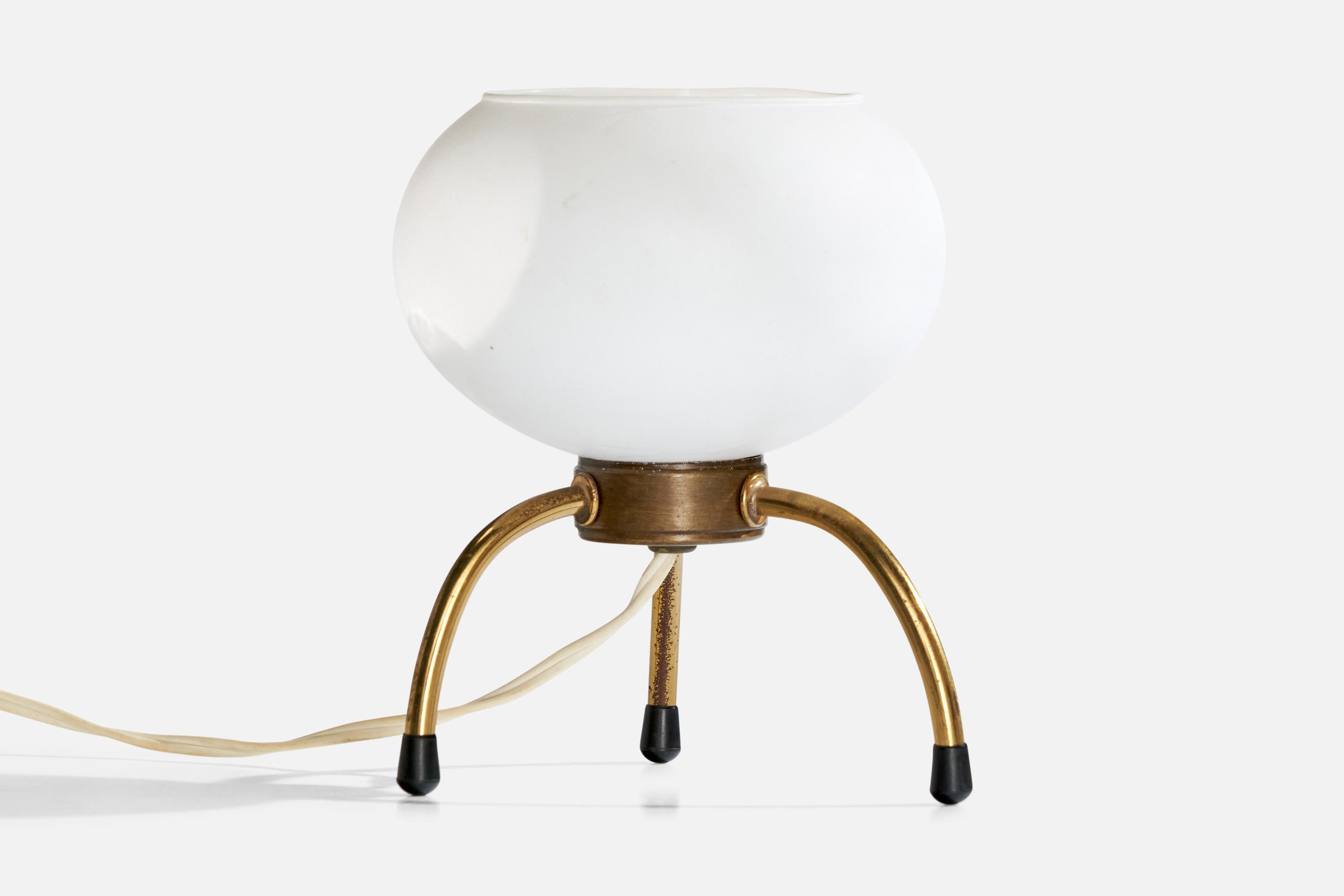 A small table lamp designed and produced in France, c. 1950s.

Dimensions of Lamp with Shade (inches): 7“ H x 6“ Diameter

Bulb Specifications: bayonet

Number of Sockets (per fixture): 1

Sold with lampshade.

All lighting will be converted for US