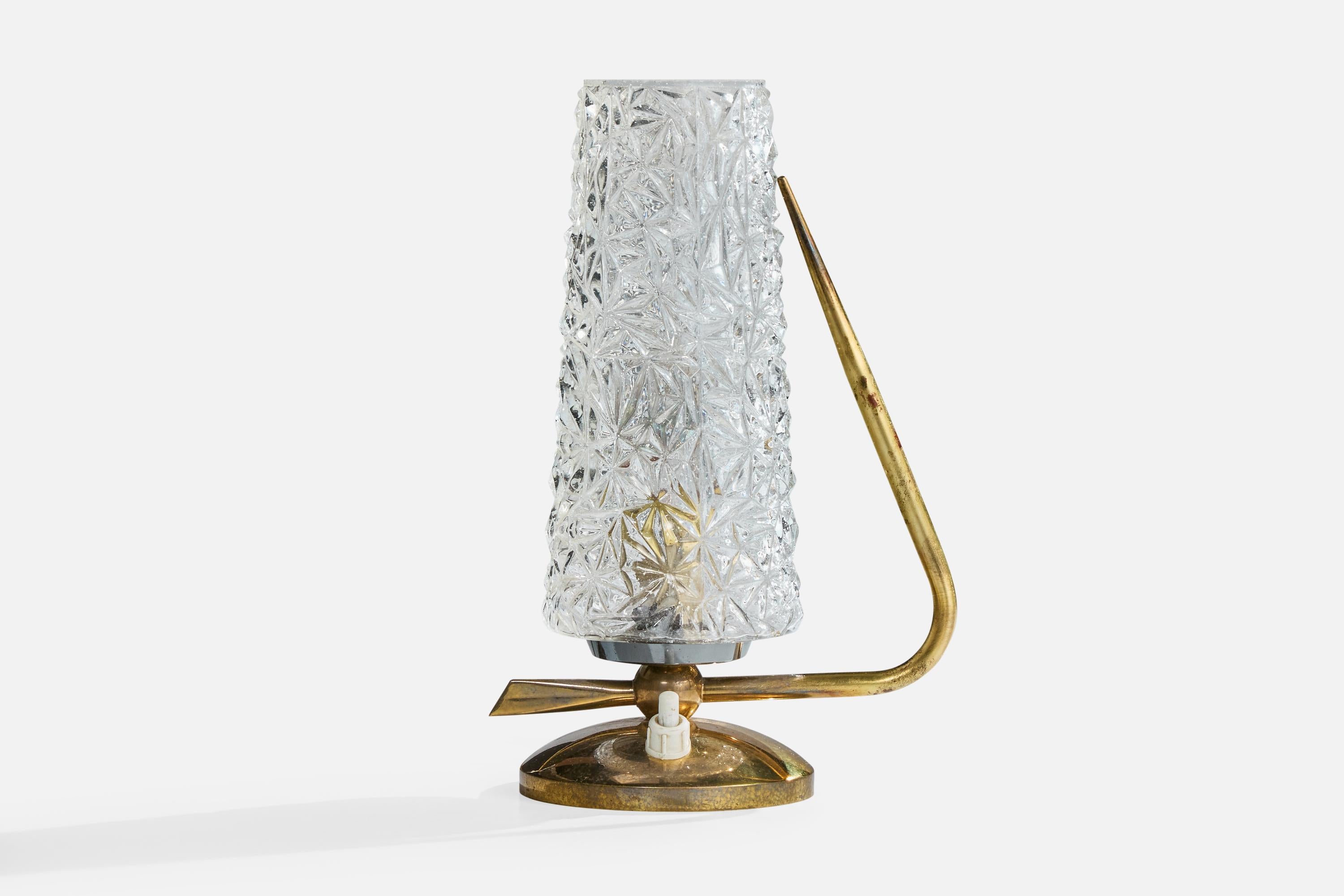 A brass and glass table lamp designed and produced in France, c. 1950s.

Dimensions of Lamp (inches): 8.5