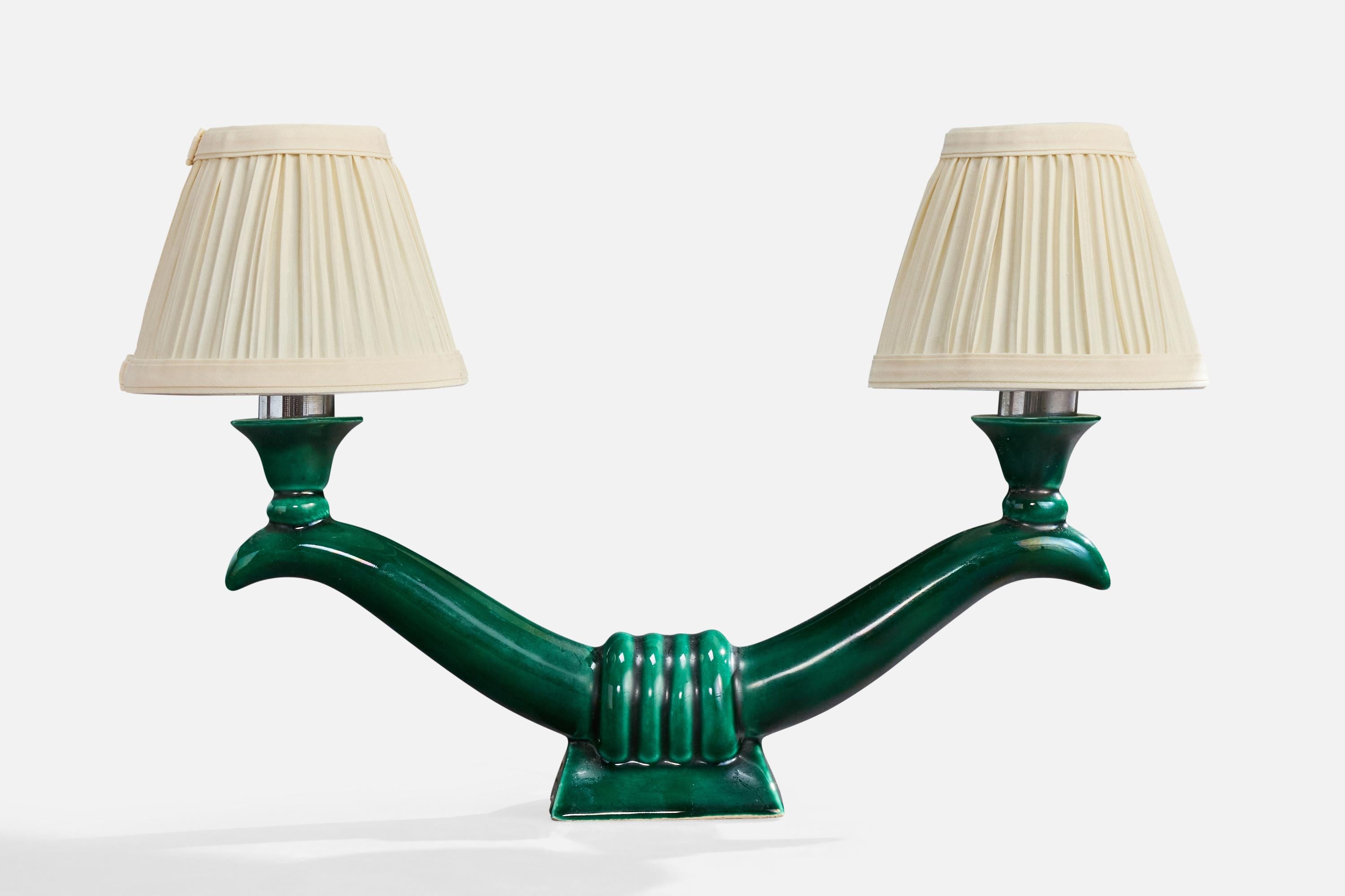 A green-glazed ceramic, metal and off-white fabric table lamp designed and produced in France, c. 1960s.

Brand new lampshades.

Overall Dimensions (inches): 10.1