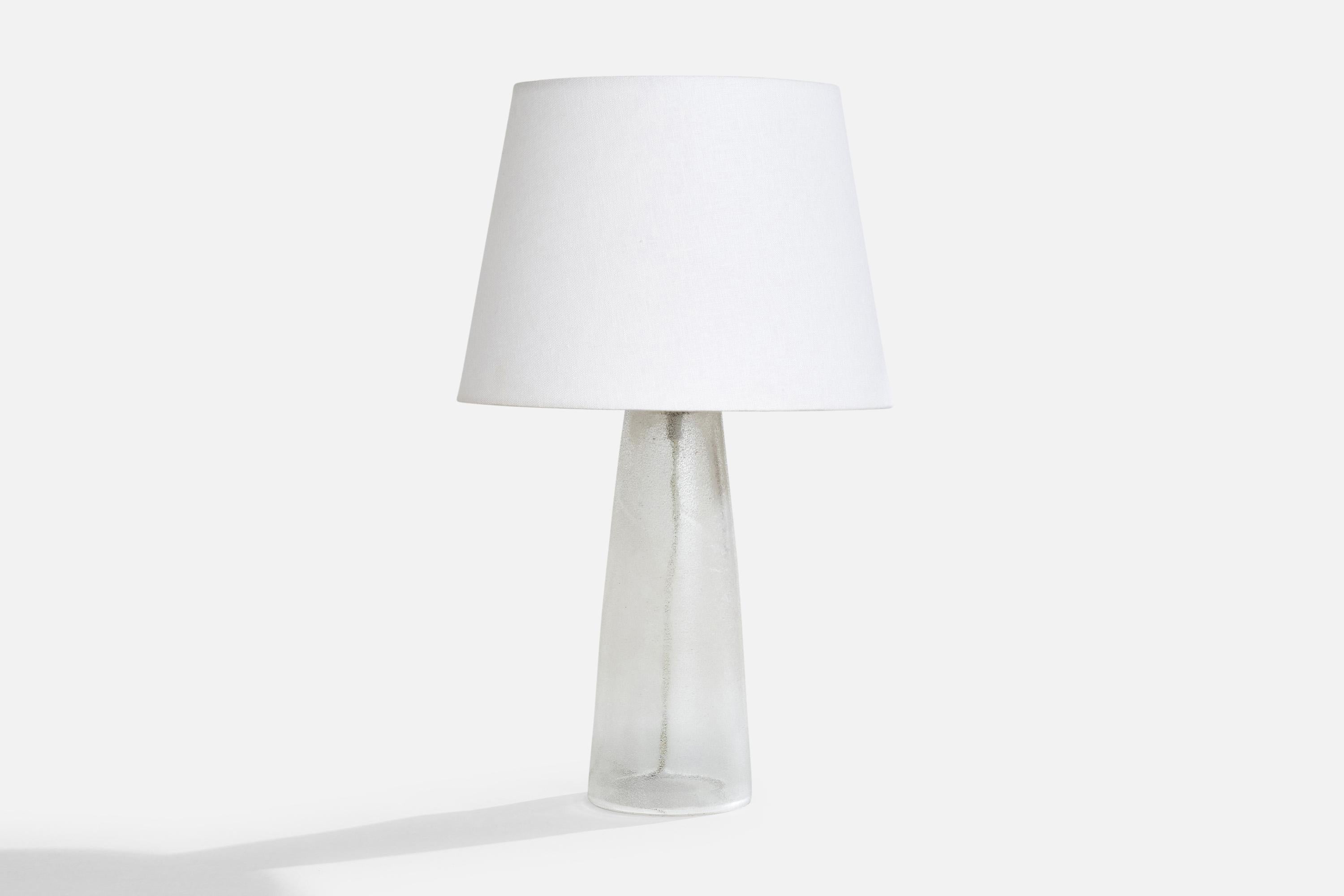 A glass and brass table lamp designed and produced in France, c. 1940s.

Dimensions of Lamp (inches): 13.75“ H x 4.6“ Diameter

Dimensions of Shade (inches): 9“ Top Diameter x 12“ Bottom Diameter x 9“ H

Dimensions of Lamp with Shade (inches): 20“ H