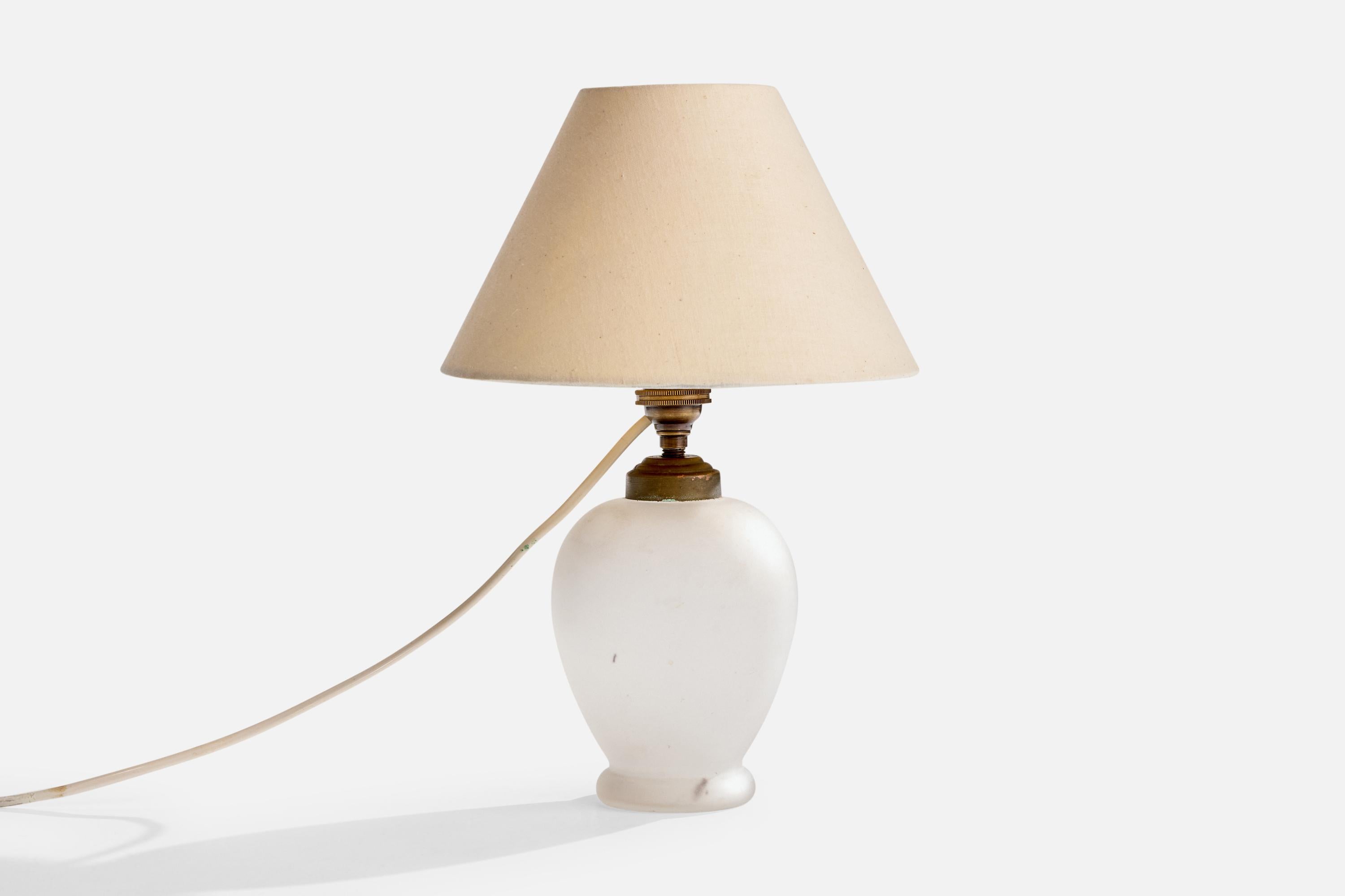 A white opaline glass and brass table lamp designed and produced in France, c. 1940s.

Dimensions of Lamp (inches): 8.0