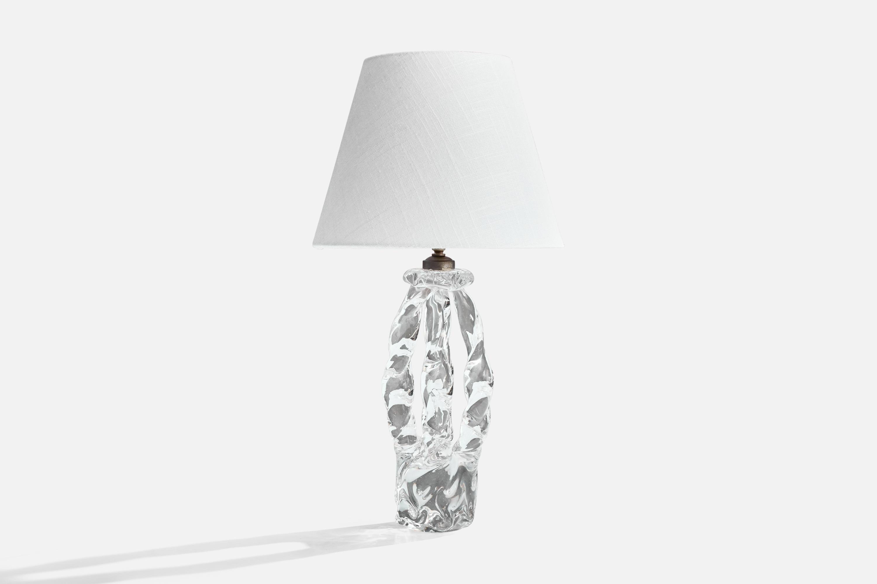 A crystal-glass table lamp designed and produced in France, c. 1950s.

Dimensions of Lamp (inches): 12.75