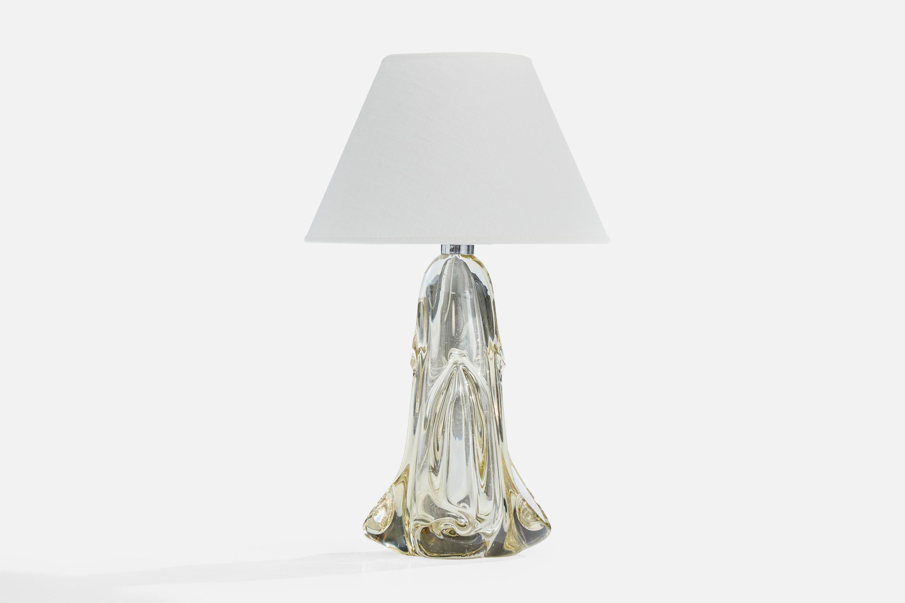 A blown crystal glass table lamp designed and produced in France, c. 1950s.

Dimensions of Lamp (inches): 11.375