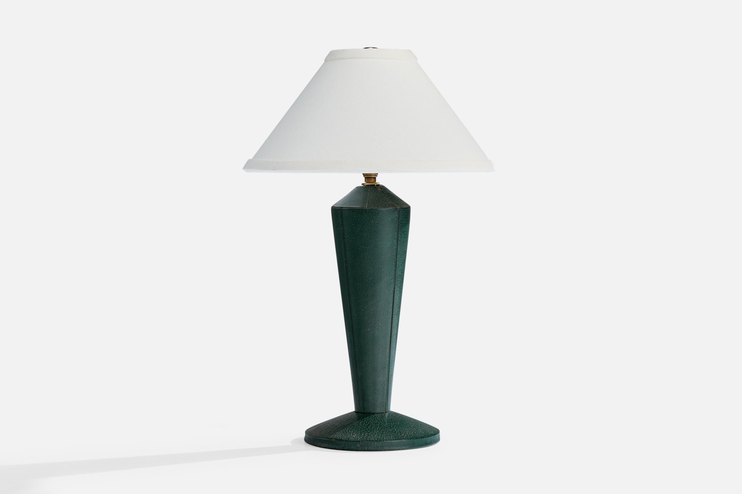 A green leather or vinyl and brass table lamp designed and produced in France, c. 1950s.

Wear consistent with age and use

Dimensions of Shade (inches): 3” Top Diameter x 10” Bottom Diameter x 5” Height

Dimensions of Lamp with Shade (inches): 16”