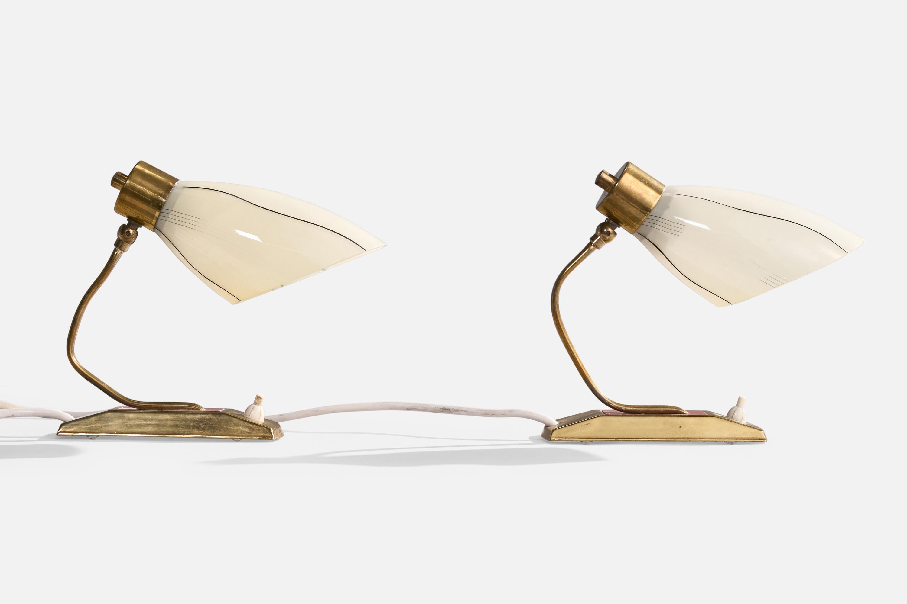 A pair brass, pink-lacquered metal and opaline glass table lamps likely designed and produced in France, c. 1950s.

Dimensions of Lamp with Shade (inches): 7.8” H x 3.625“ W x 9” D

Bulb Specifications: E-14 Bulb

Number of Sockets (per fixture):
