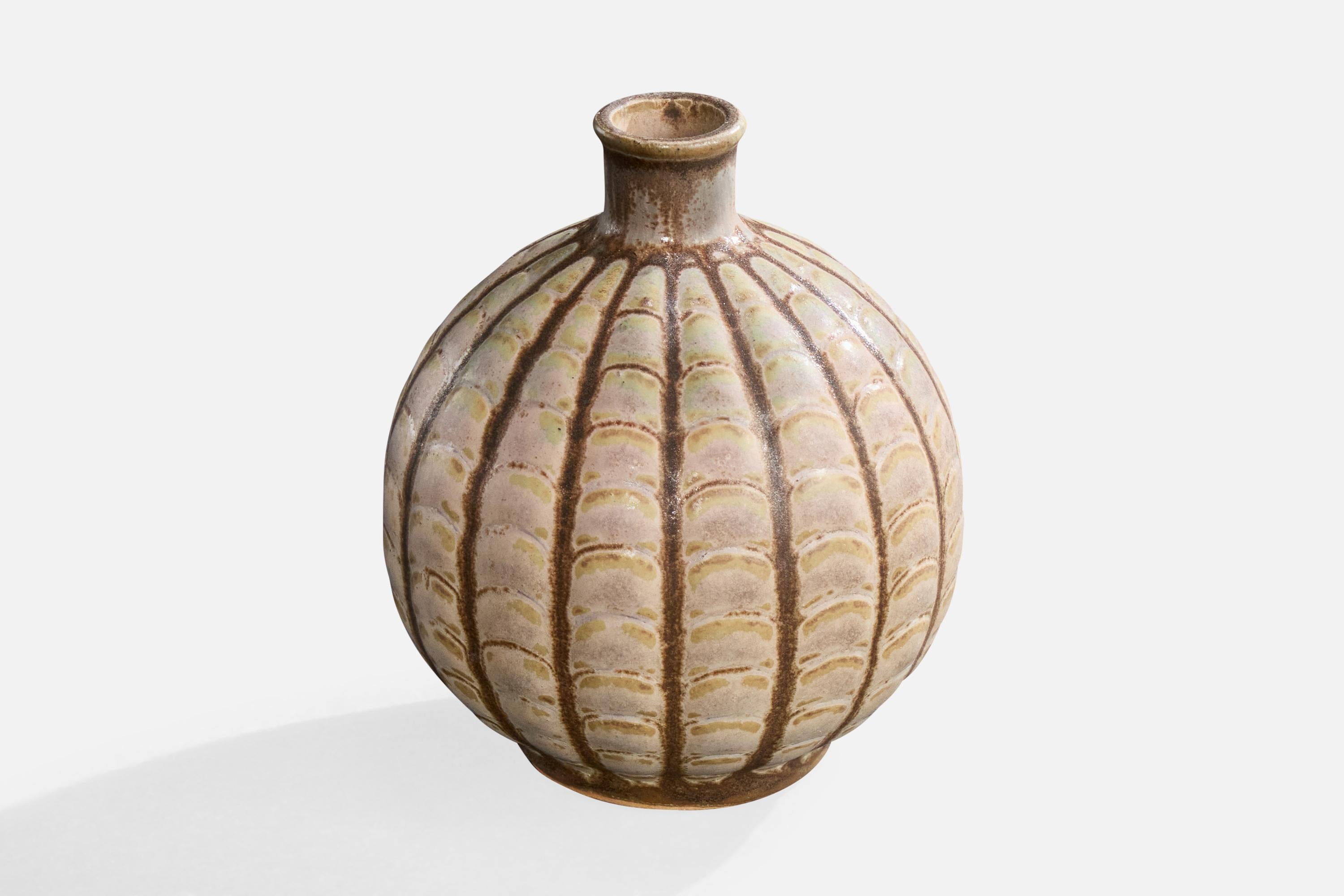 A fluted grey and brown-glazed ceramic vase produced in France, c. 1950s.

Overall Dimensions (inches): 3.8
