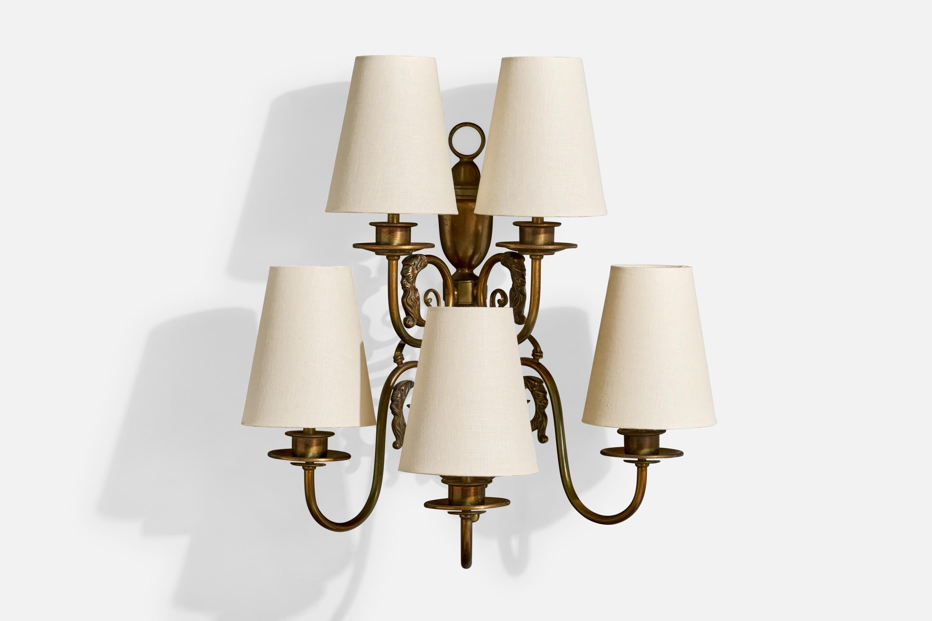 A brass and white fabric wall light designed and produced in France, c. 1950s.

Overall Dimensions (Inches): 19” H x 16.5” W x 11.25“ D

Back Plate Dimensions (Inches): 16” H x 3.5“ W x 1” D

Bulb Specifications: Bayonet

Number of Sockets (per
