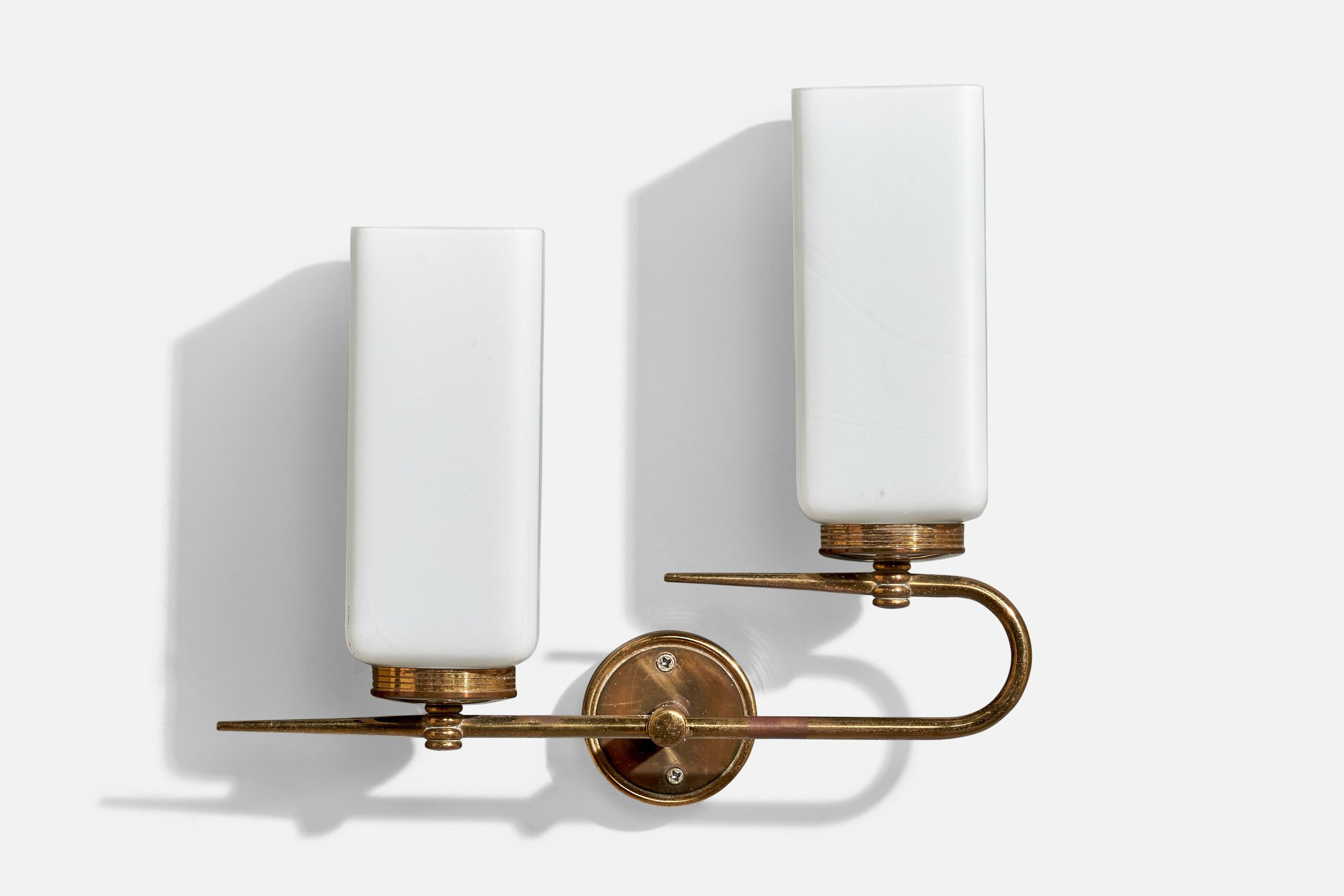 A brass and white opaline glass wall light designed and produced in France, c. 1950s.

Overall Dimensions (inches):  9.75” H x  11” W x  3.5“ D

Back Plate Dimensions (Inches):  2.5” H x 2.5” W x .75” D

Bulb Specifications: bayonet

Number of