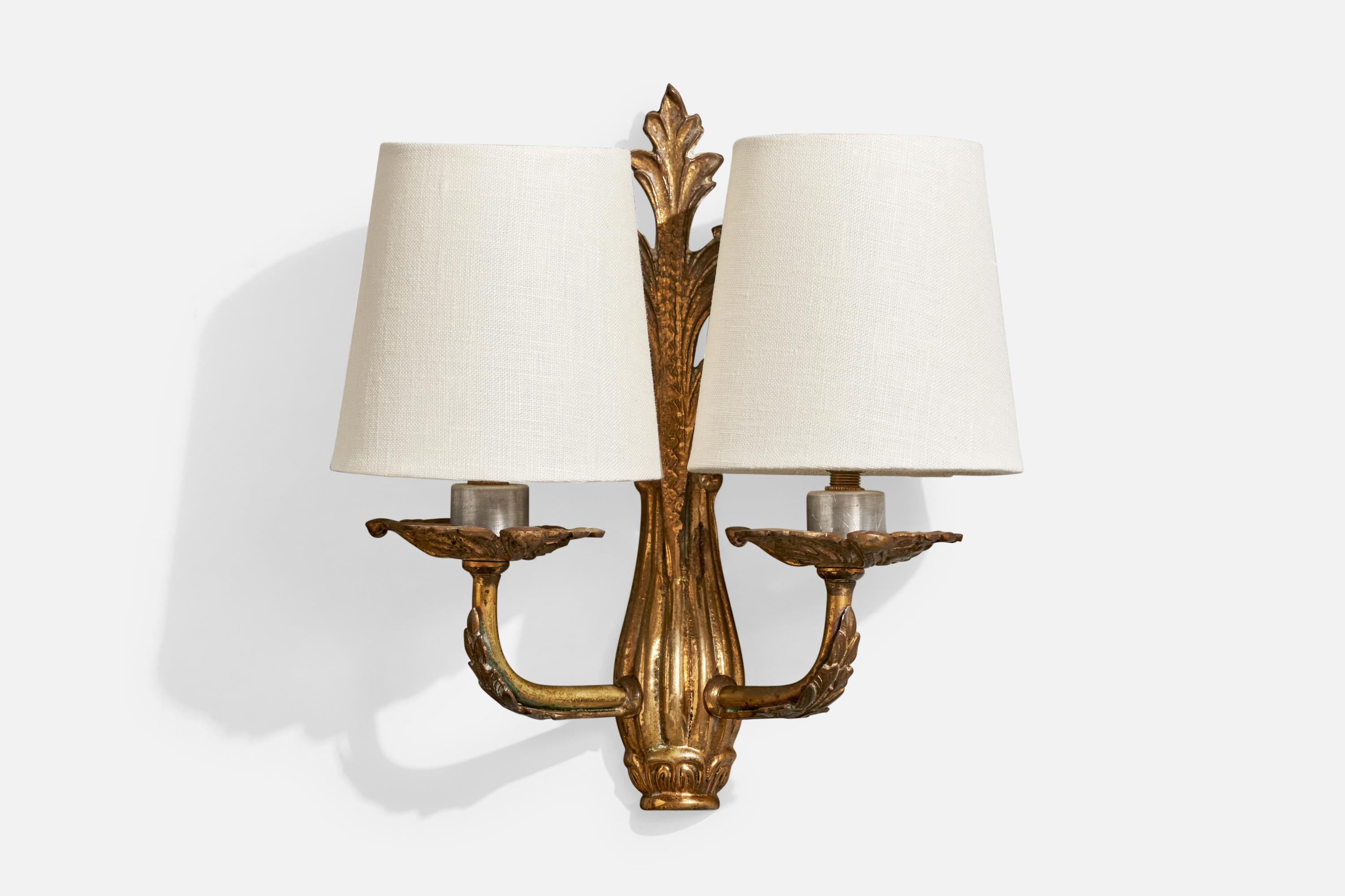 A brass, metal and white fabric wall light designed and produced in France, c. 1940s.

Overall Dimensions (Inches): 9.25” H x 8.5” W x 4.75“ D

Back Plate Dimensions (Inches): 5.25” H x 1.75“ W x .75” D

Bulb Specifications: E-14 incandescent