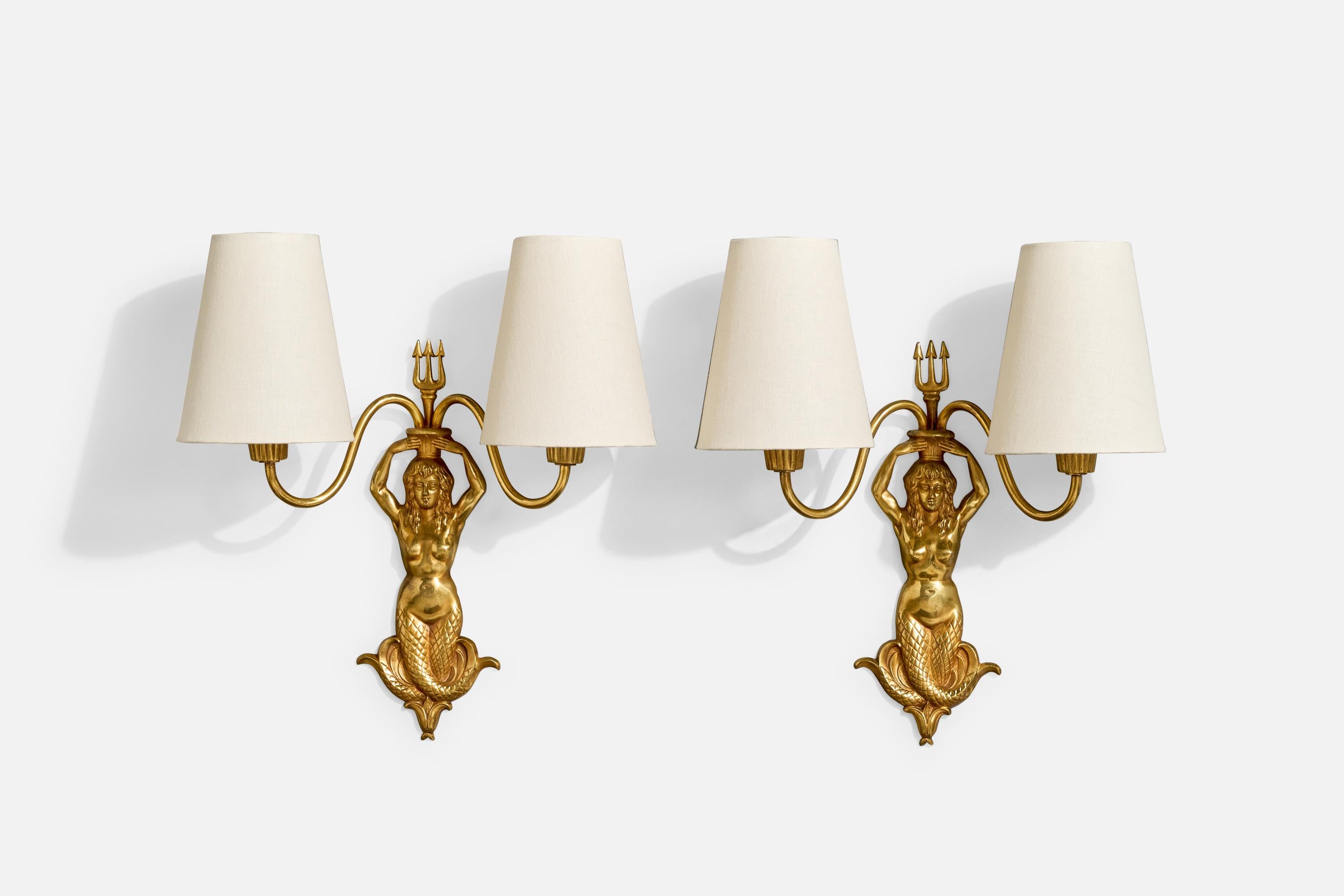 A pair of brass and white fabric wall lights designed and produced in France, c. 1950s.

Brand new fabric shades.

Overall Dimensions (Inches): 15.5” H x 14.25” W x 5.75“ D

Back Plate Dimensions (Inches): 12” H x 4.375“ W x 1” D

Bulb