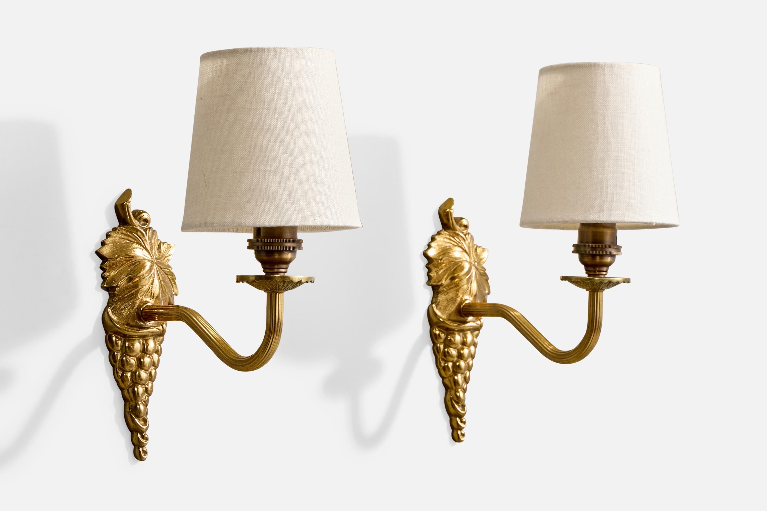 A pair of brass and white fabric wall lights designed and produced in France, c. 1950s.

Overall Dimensions (Inches): 9.75