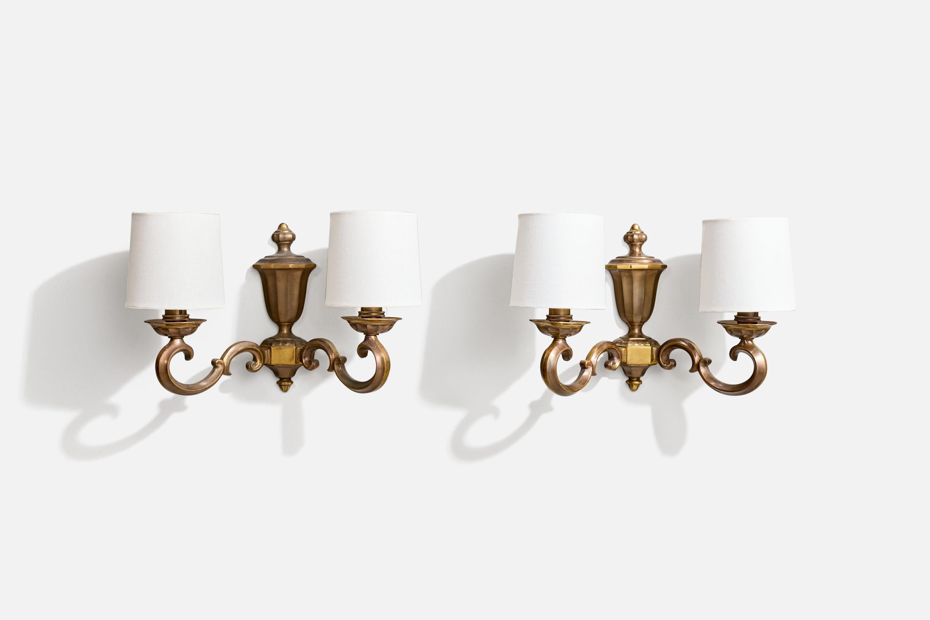 A pair of brass and white fabric wall lights designed and produced in France, c. 1950s.

Overall Dimensions (Inches): 8.5