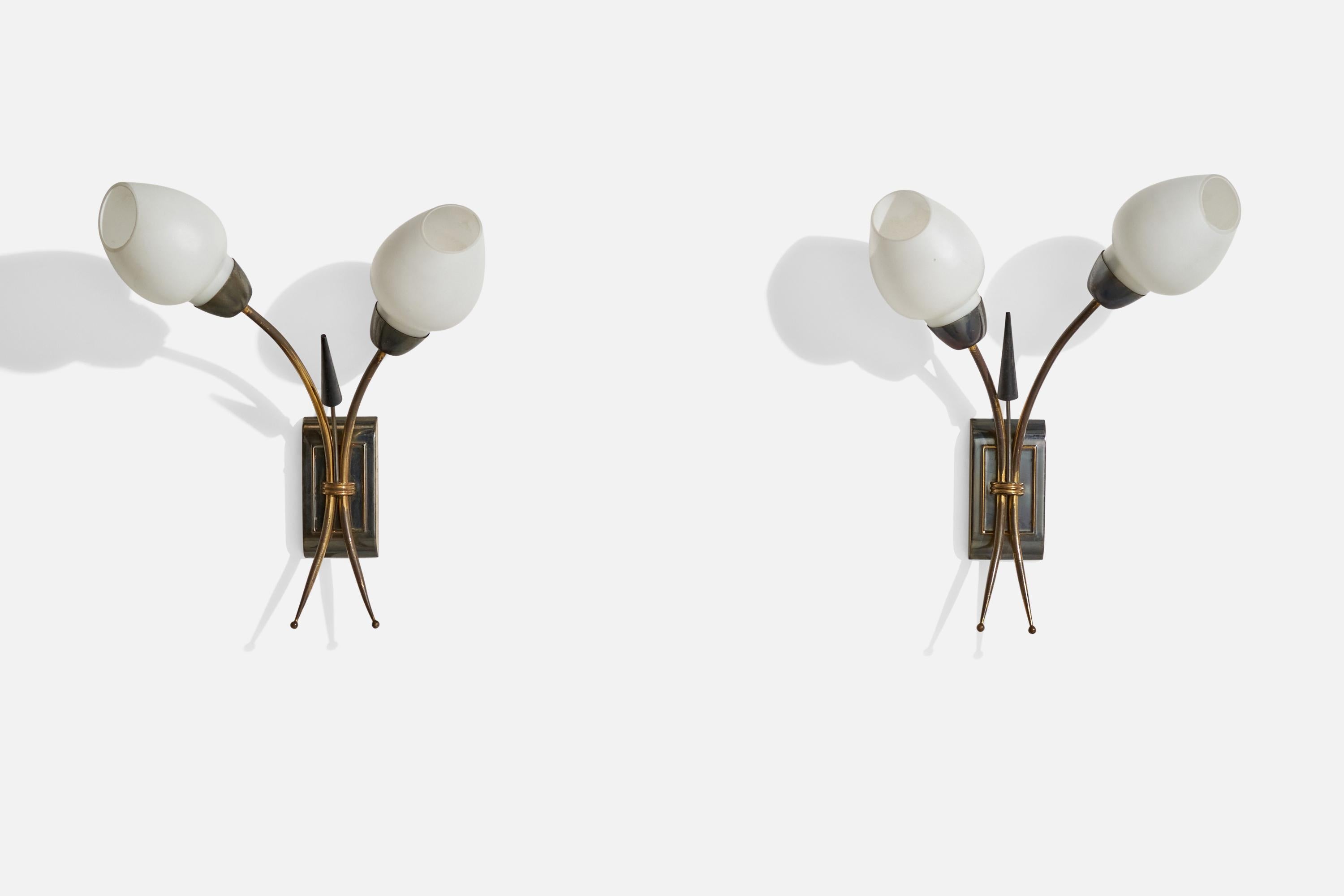 A pair of brass and opaline glass wall lights designed and produced in France, c. 1950s.

Overall Dimensions (inches):  14.25” H x  11.5” W x  5.5“D
Back Plate Dimensions (Inches):  4.75” H x 2.5” W x .75” D
Bulb Specifications: Bayonet Bulbs
Number
