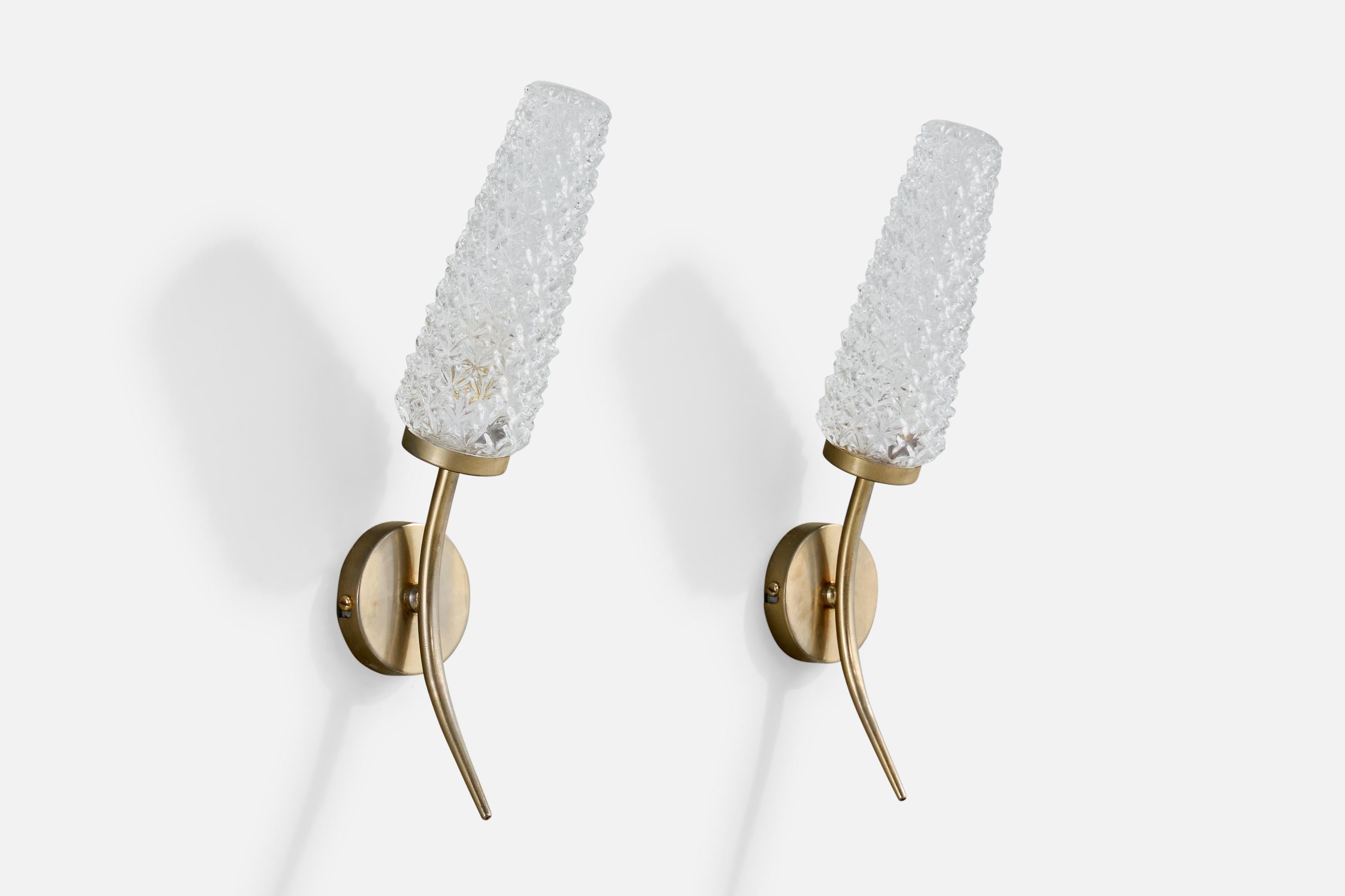 A pair of brass and glass wall lights designed and produced in France, c. 1950s.

Overall Dimensions (Inches): 13.0
