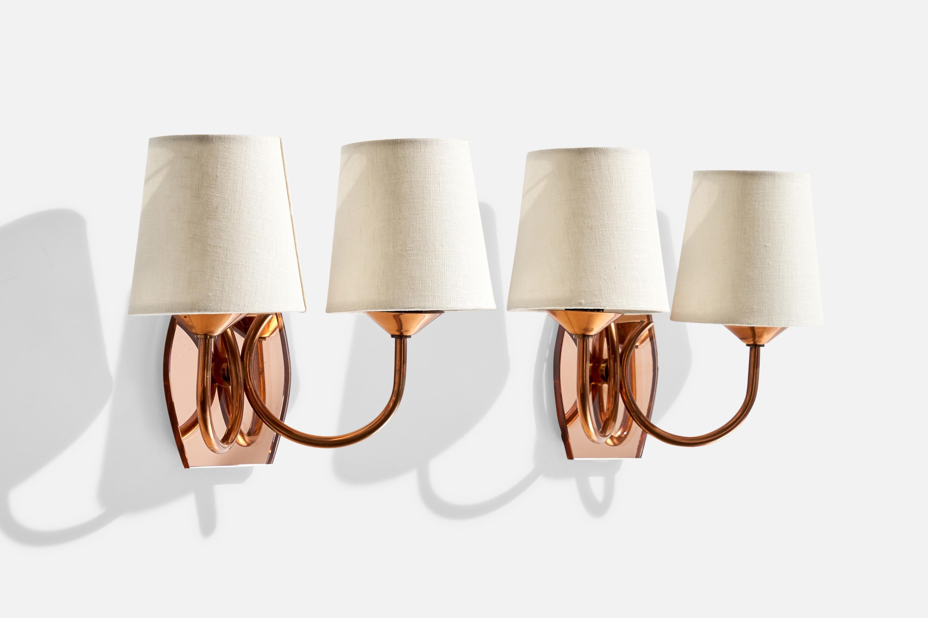 A pair of copper, pink mirror glass and white fabric wall lights designed and produced in France, c. 1950s.

Overall Dimensions (inches):  5” H x 8” W x  4.75 “D
Back Plate Dimensions (Inches):5 ” H x 3.75 ” W x .50 ” D
Bulb Specifications: E-12