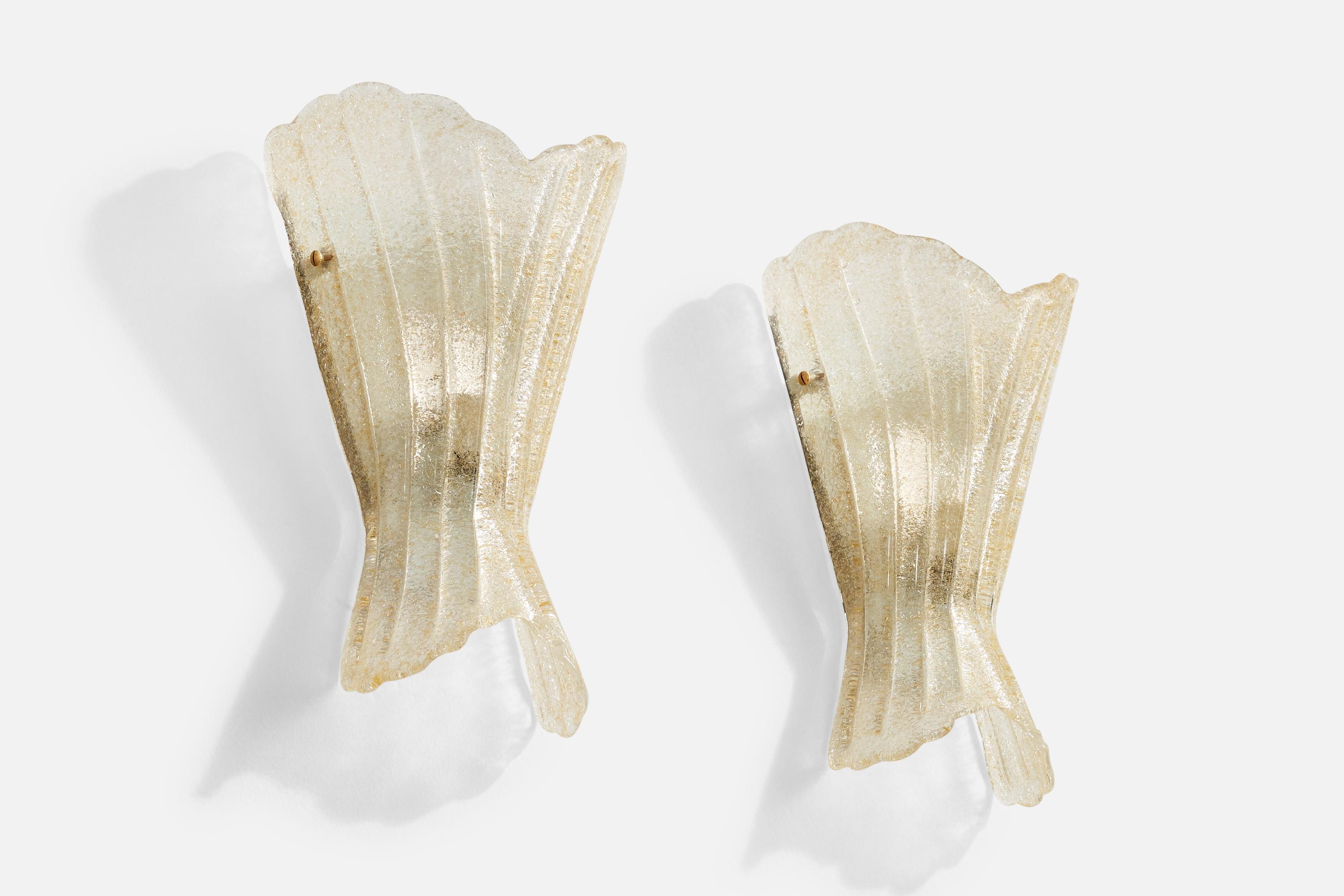 A pair of blown glass with gold-leaf and brass wall lights designed and produced in France, c. 1970s.

Overall Dimensions (Inches): 14.75” H x 9.8” W x 5“ D

Back Plate Dimensions (Inches): 10.25” H x 8.25“ W

Bulb Specifications: E-26

Number of