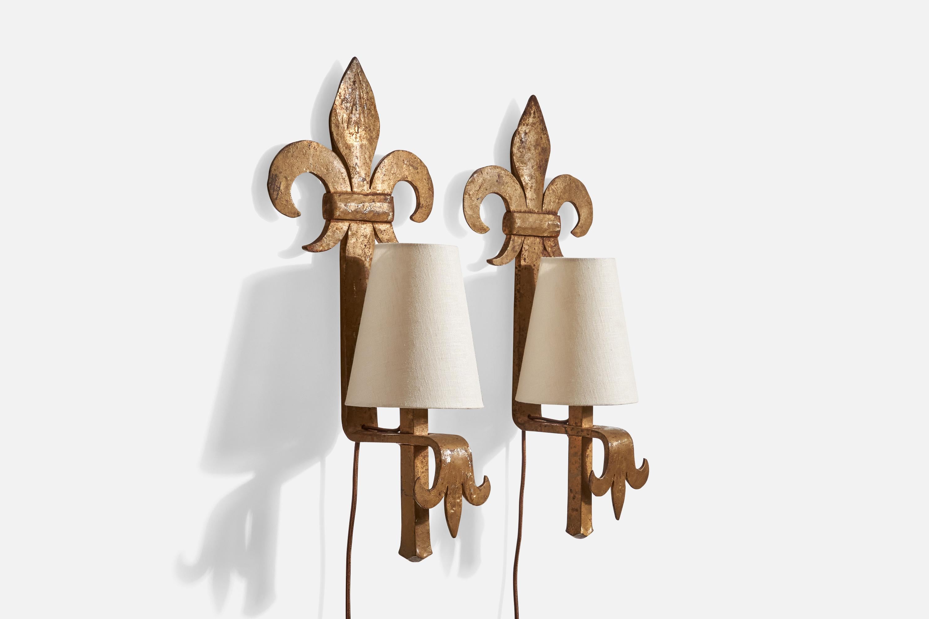 A pair of bronze-painted iron and white fabric wall lights designed and produced in France, c. 1940s.

Replaced sockets and brand new lampshades.

Overall Dimensions (Inches): 19” H x 8.5” W x 5.4” D

Back Plate Dimensions (Inches): 5.4” H x 1.75” W