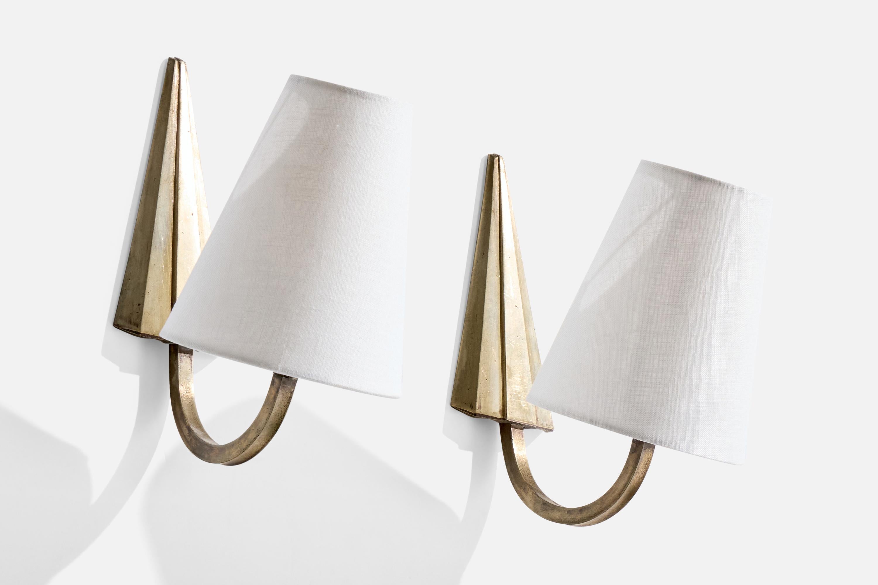 A pair of metal and white fabric wall lights designed and produced in France, c. 1940s.

Brand new fabric shade. Wall light originally configured with arm pointing down. Will require custom installation in current configuration.

Overall Dimensions