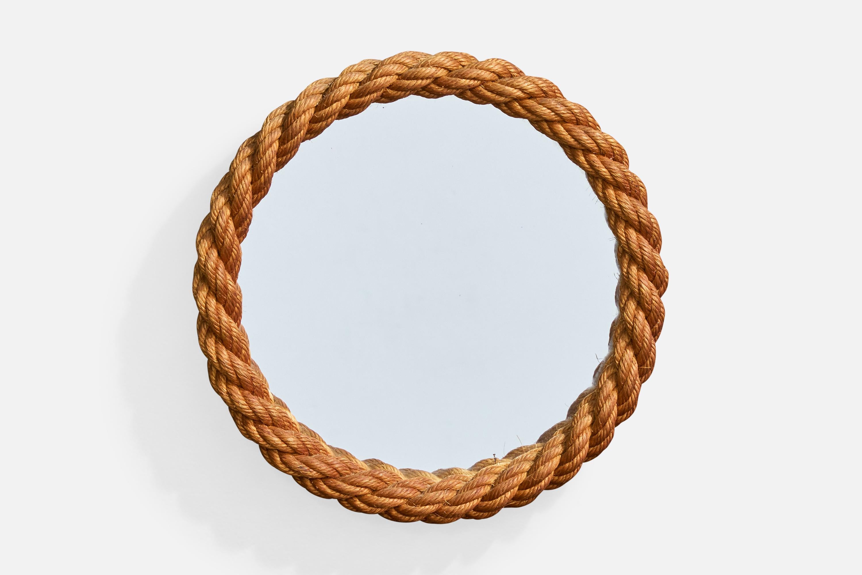 Miroir mural en corde brune, conçu et produit en France, c. années 1970.

Dimensions globales (pouces) : 12.875 