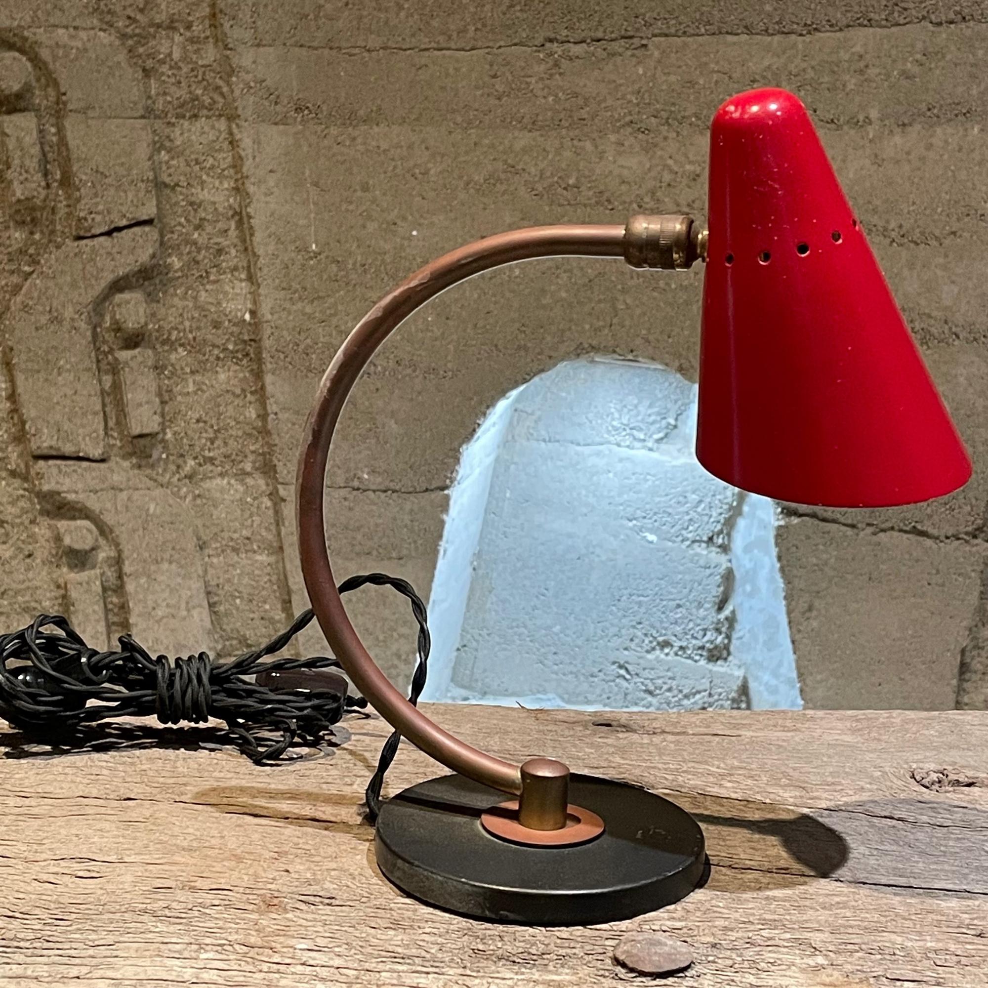 French desk table lamp lovely red perforated cone shade 1950s France
French Bayonet bulb is required. Unmarked. in the Style of Pierre Guariche.
Measures: 9.75 tall x 4.25 W x 8.5 D inches
Original unrestored preowned condition.
See our images