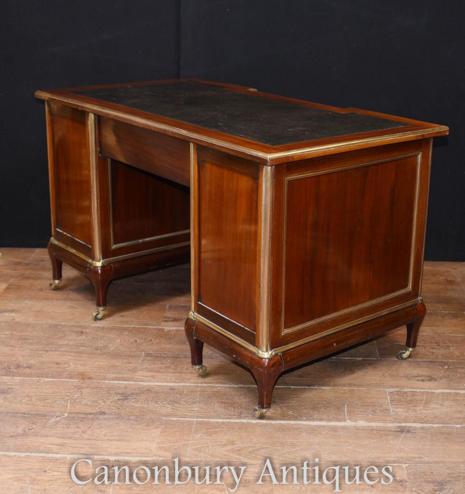 Elegant French Empire knee hole desk we date to circa 1890
Wonderful French desk with brass channelled inlay
Such a good look to this piece, refined and very stylish from all angles
Easy to move as on castors, great for a home office set up
Nine