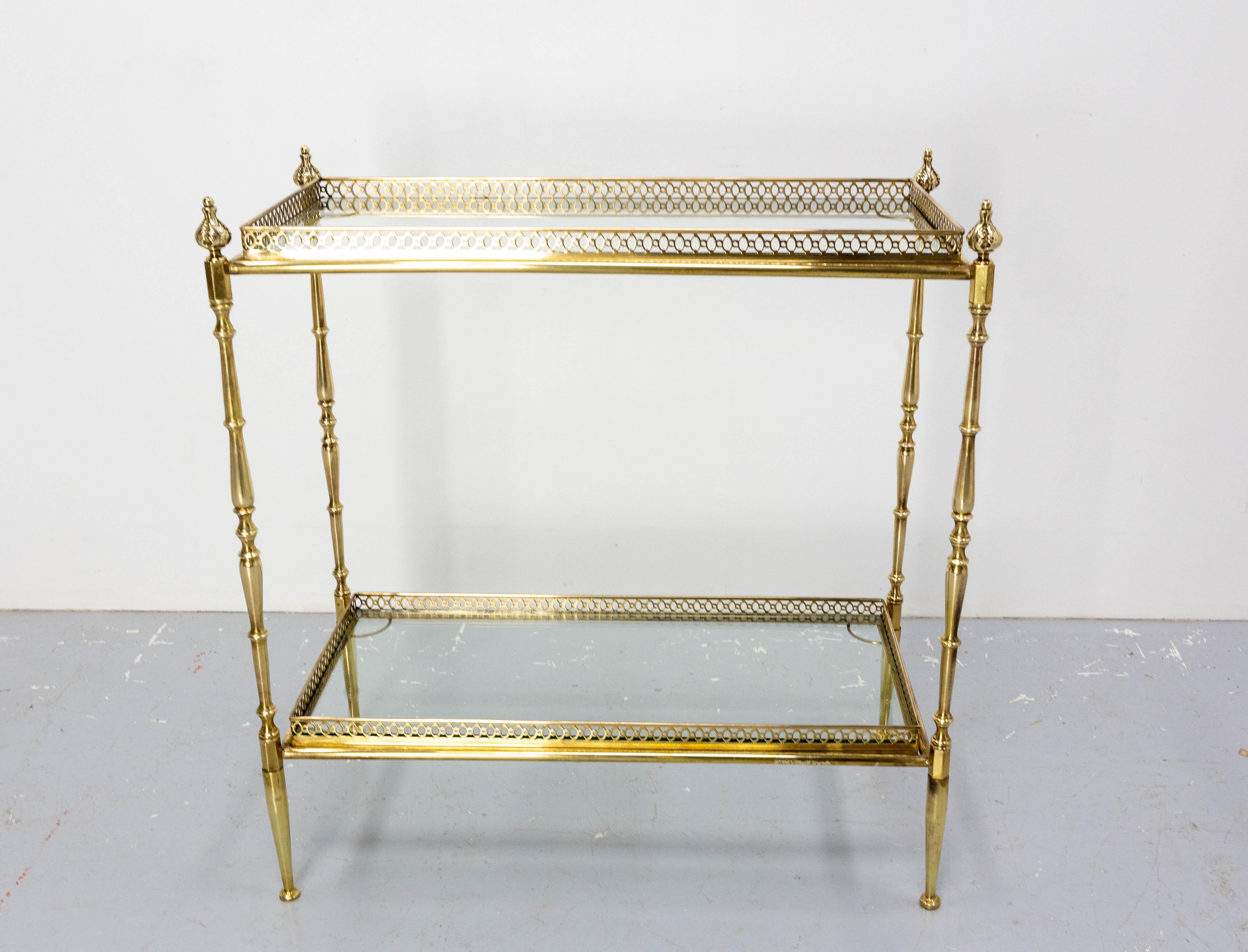 Side table or desserte table glass and brass. 
Made circa in the Jansen style.
The use of only glass and brass materials gives this a very airy appearance.
Nice patina.
French.
Good antique condition with few marks of use.

