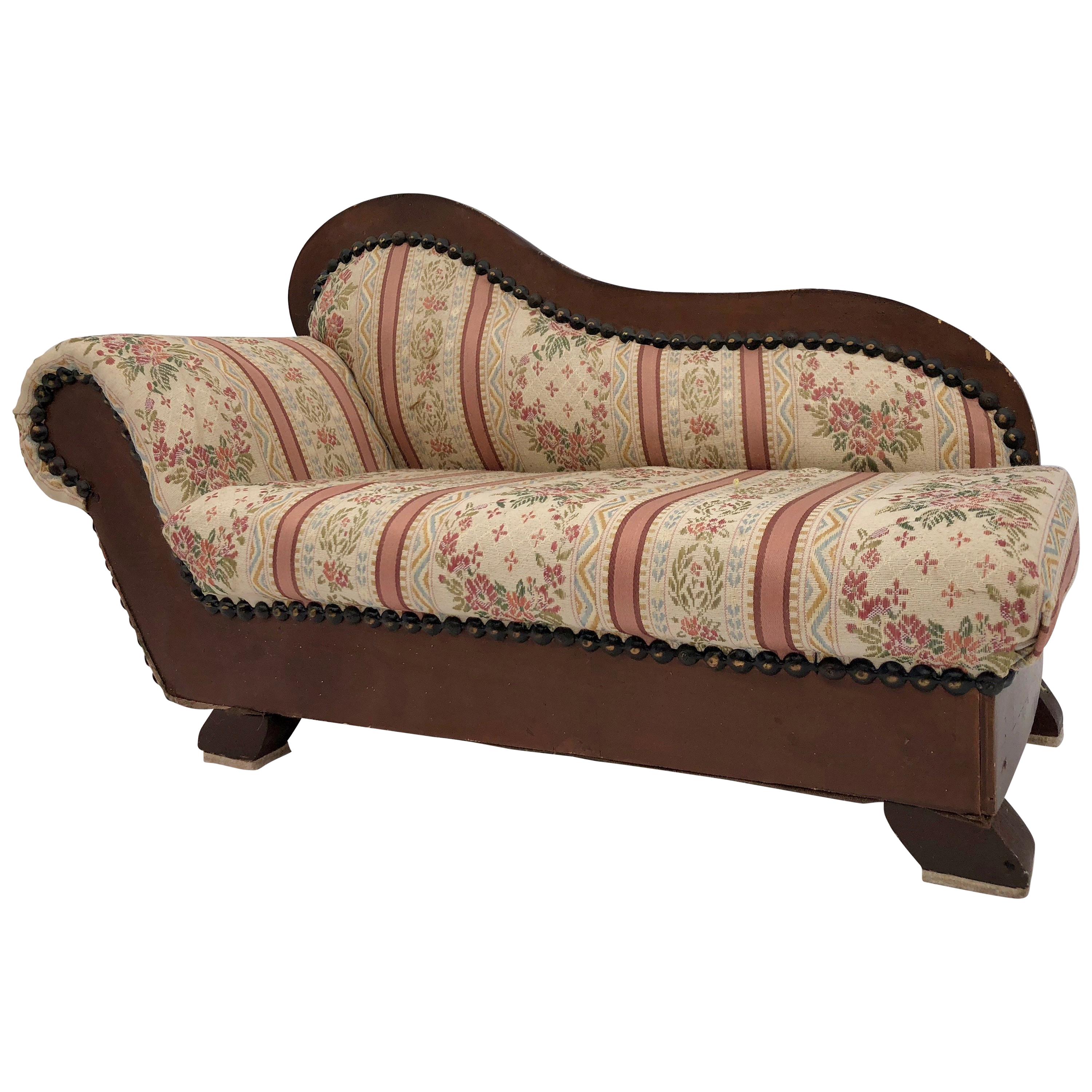 French Detailed Wood Doll Sofa Covered in Silk Fabric with Fabric Tacks and Feet For Sale