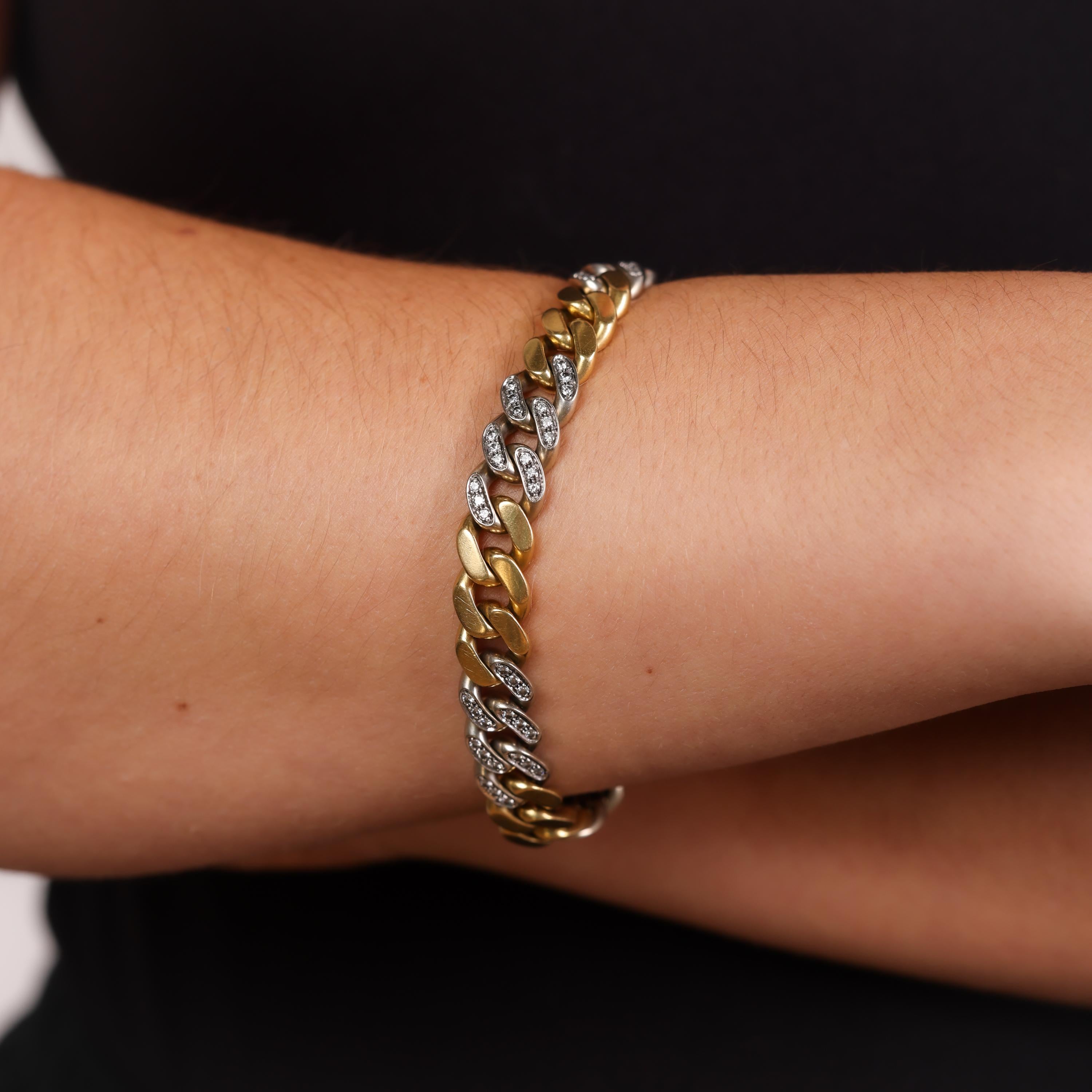 This vintage 18k yellow and white gold bracelet sparkles with 91 brilliant diamonds, showcasing timeless elegance and exceptional craftsmanship from the 1960s.

Center Stone: 91 round brilliant cut diamonds
Weight: Approximately 2 carats
Color: