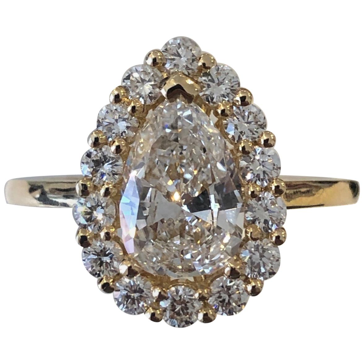 French Diamond Cluster Ring with a 2.01 Carat Pear Shape Diamond Certified GIA For Sale