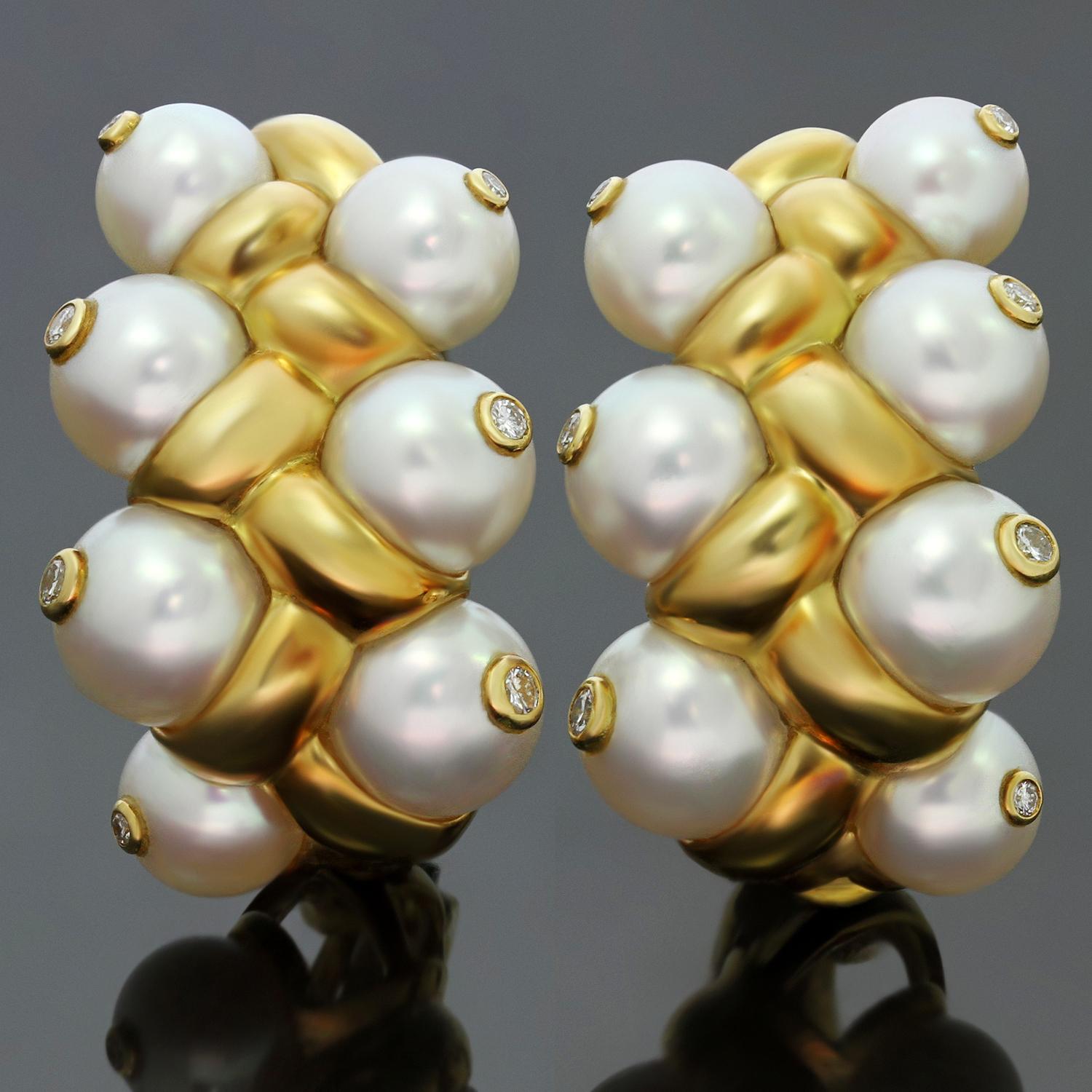 These gorgeous clip-on earrings are crafted in 18k yellow gold and feature clusters of cultured pearls ranging in size from 7.00mm to 8.65mm and accented with full-cut diamonds weighing an estimated 0.38 carats. The pearls are white and clean with