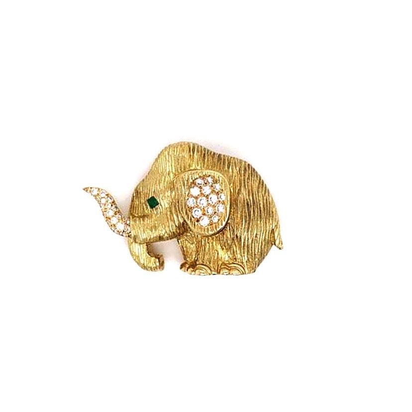 A fun, cute and excellently crafted piece. This elephant brooch features round brilliant cute diamonds set on the elephant’s ears and tusk as well as one emerald used as its eye. Made in France using 18K yellow gold, this pin shows the quality