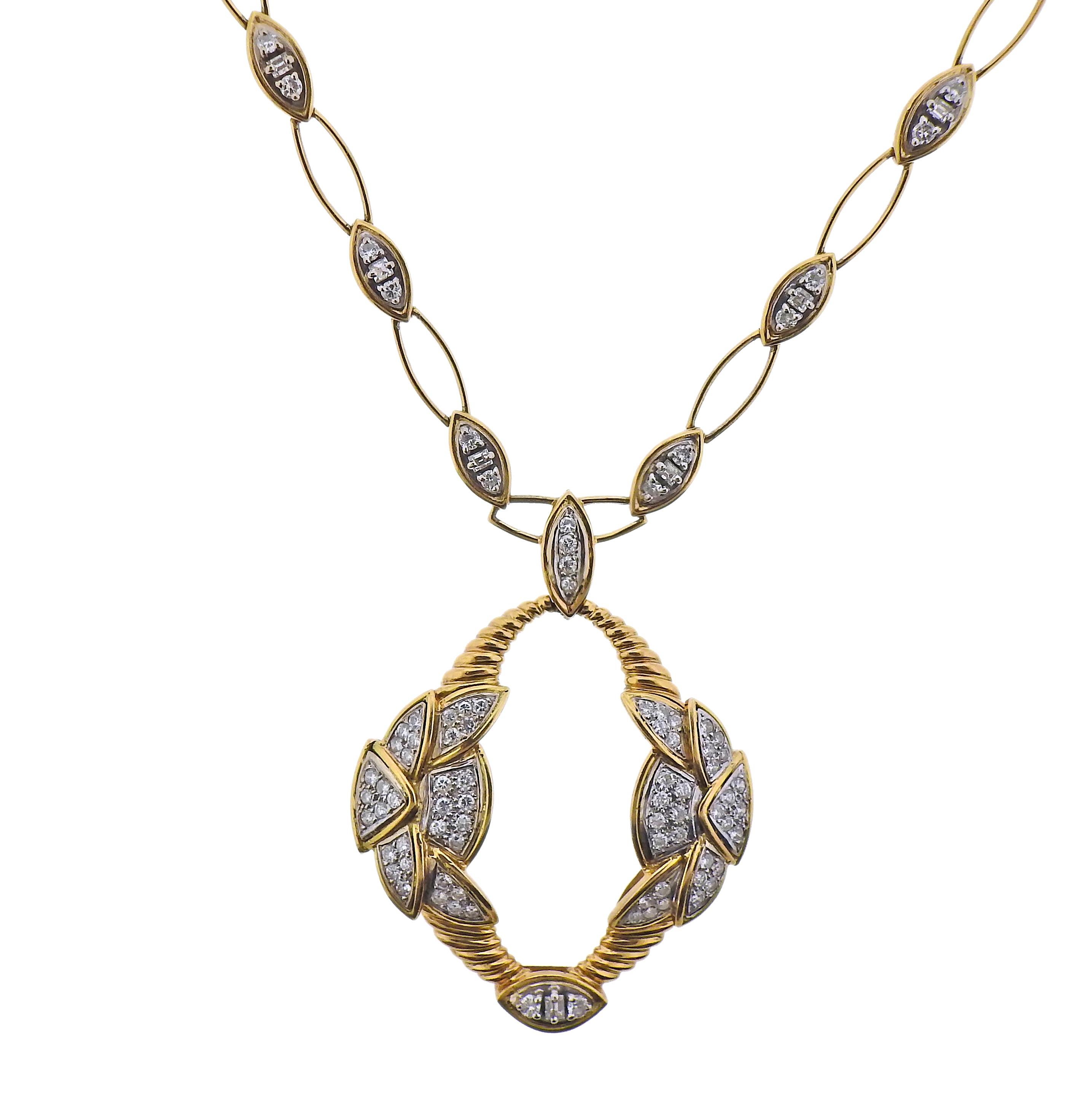 French made 18k gold link necklace with pendant. Set with approx. 5.00ctw in diamonds. Necklace is 24.5