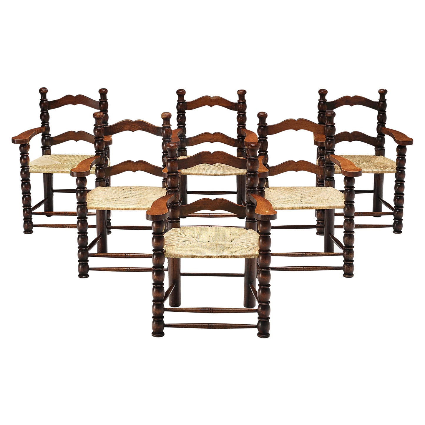 Chaises de salle à manger françaises en bois teinté et paille en vente