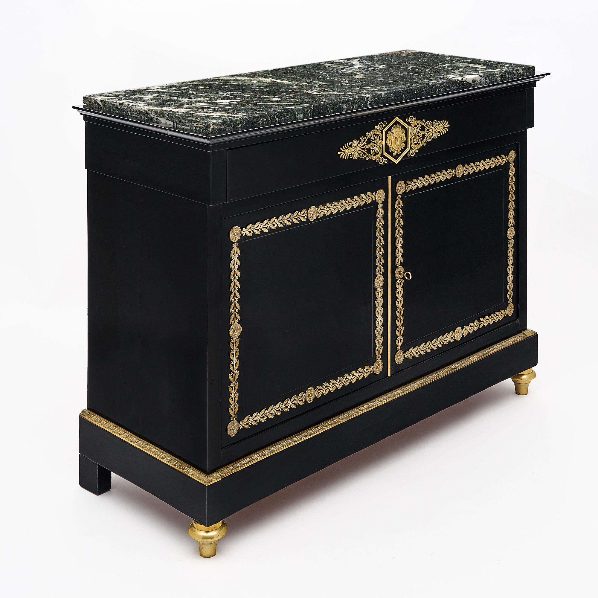 A superb antique French Directoire buffet in the manner of Jacob-Desmalter, the “ebeniste