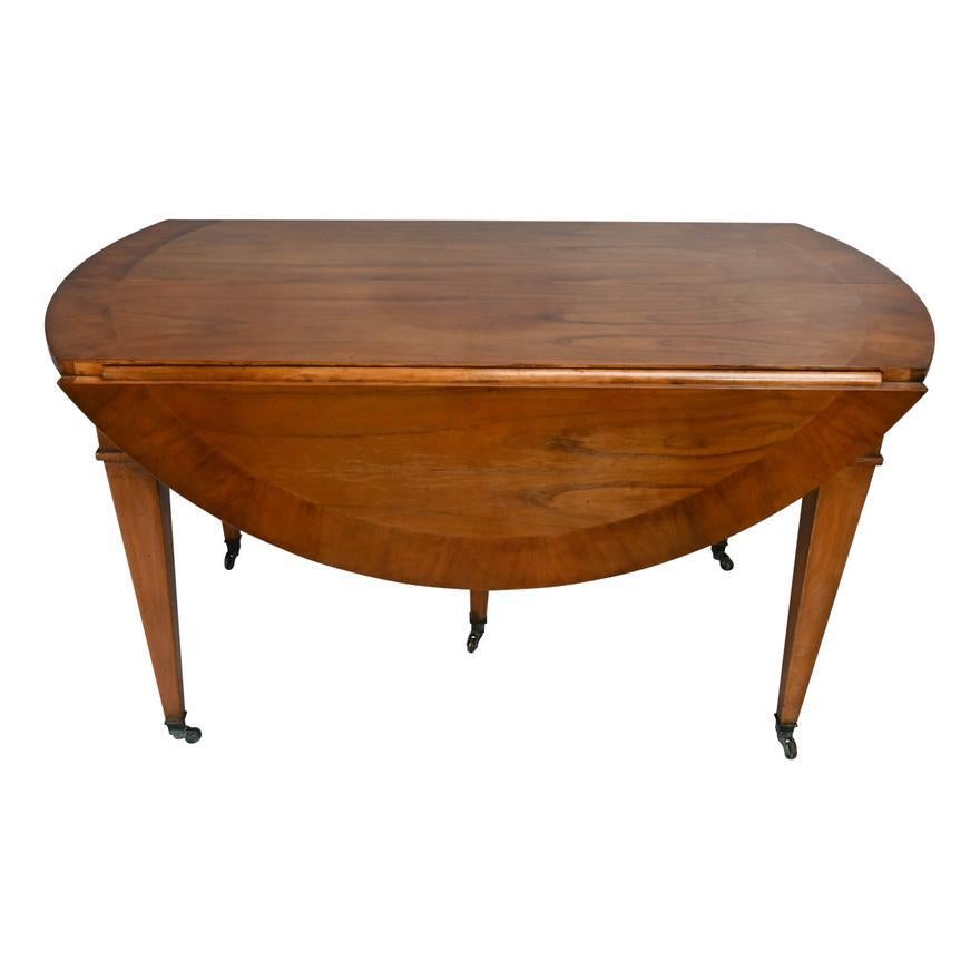 Hand-Crafted French Directoire Cross Banded Mahogany Drop Leaf Extension Dining Table 20th C For Sale