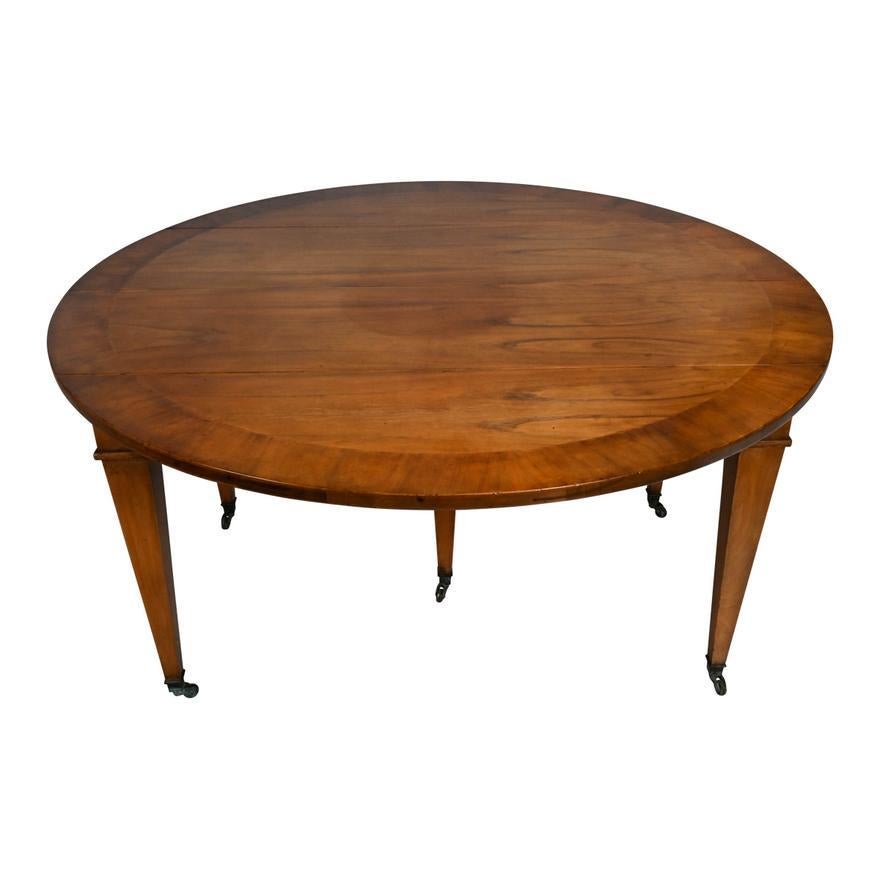 French Directoire Cross Banded Mahogany Drop Leaf Extension Dining Table 20th C In Good Condition For Sale In Los Angeles, CA