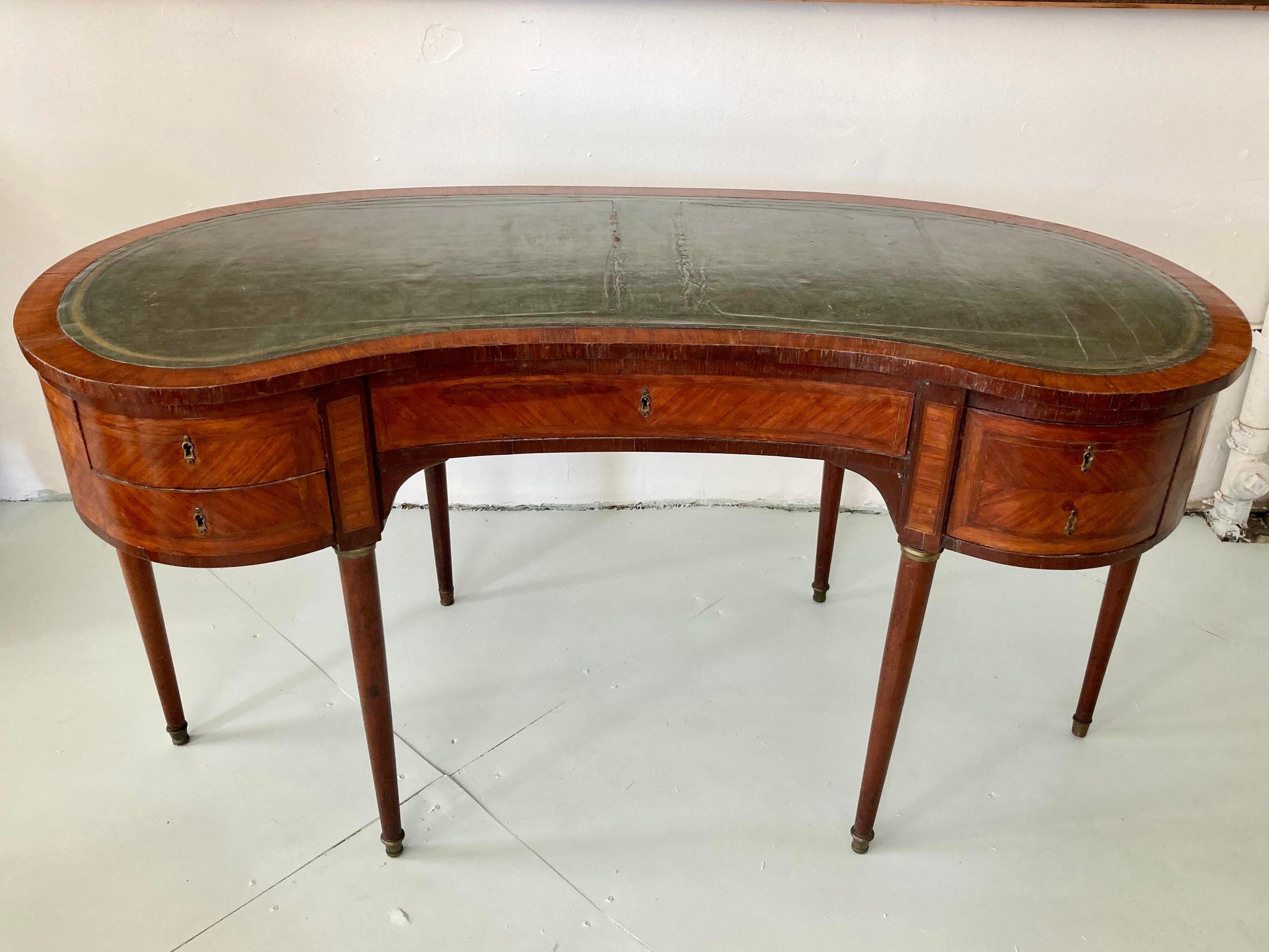 Vintage French directoire desk. Wonderful shape with inset green leather top. Great storage too. Add some French Architecture to your home.