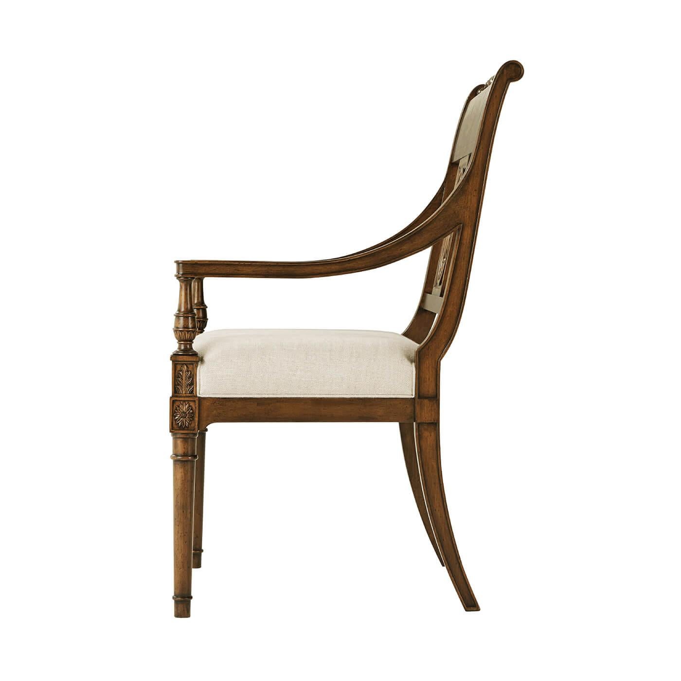 French Directoire style dining armchair, a hand carved distressed beech and oak dining chair with turned top rail, down scrolled uprights and arms enclosing Anthemion carved splat, turned and carved baluster uprights with Acanthus carved bases, an