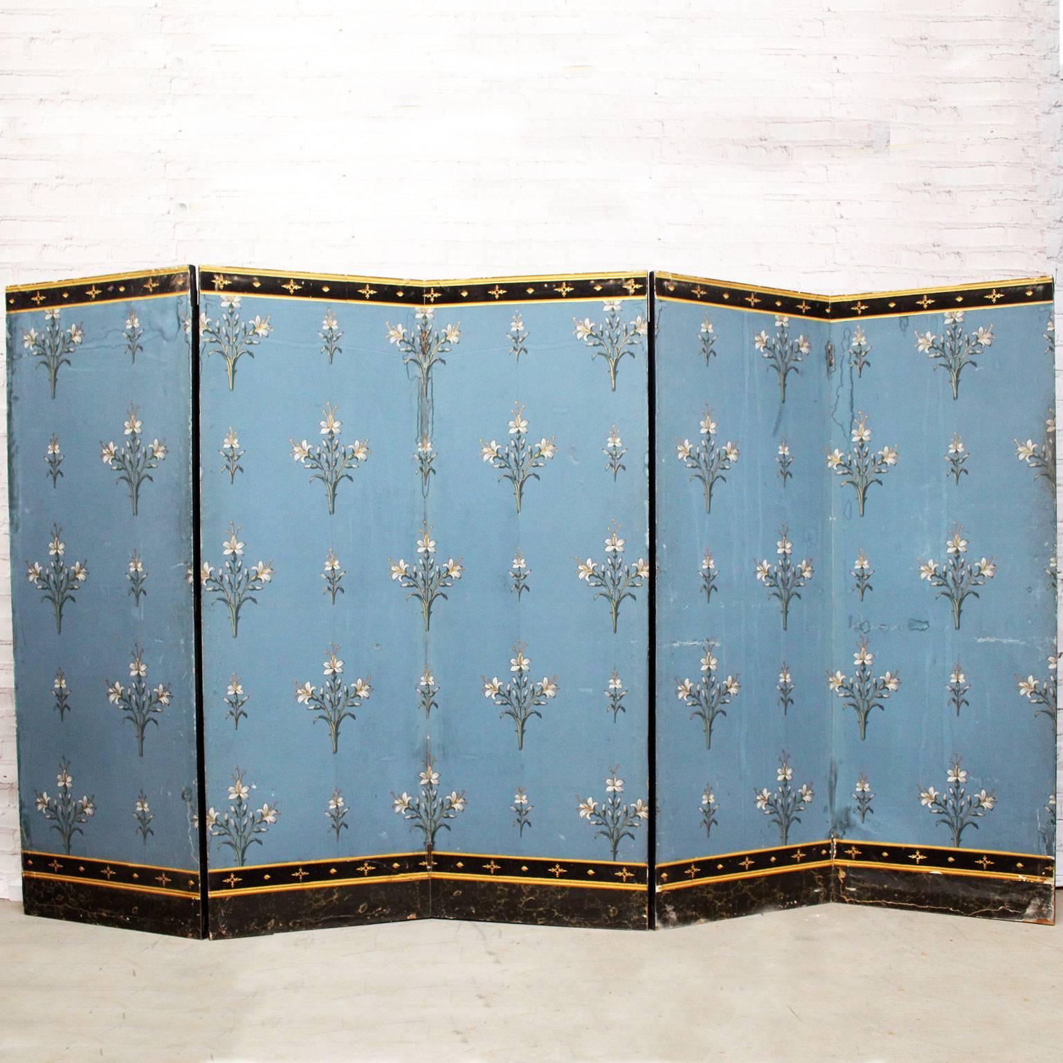 This shabby chic five panelled room screen is the most extraordinary color, it is almost impossible to describe the astonishing shade of blue. The paper has been hand decorated with real gold leaf - it is very unusual to find this decoration in