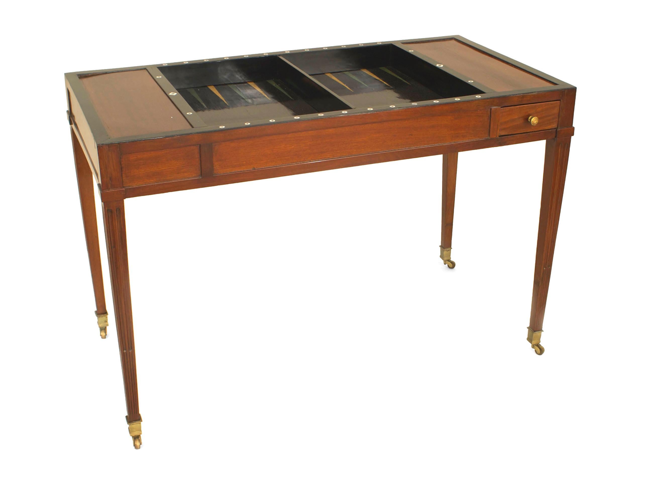 French Directoire (early 19th century) rectangular mahogany game table with a flip top revealing backgammon (tric-trac) game board and a green felt bottom side to top.
 