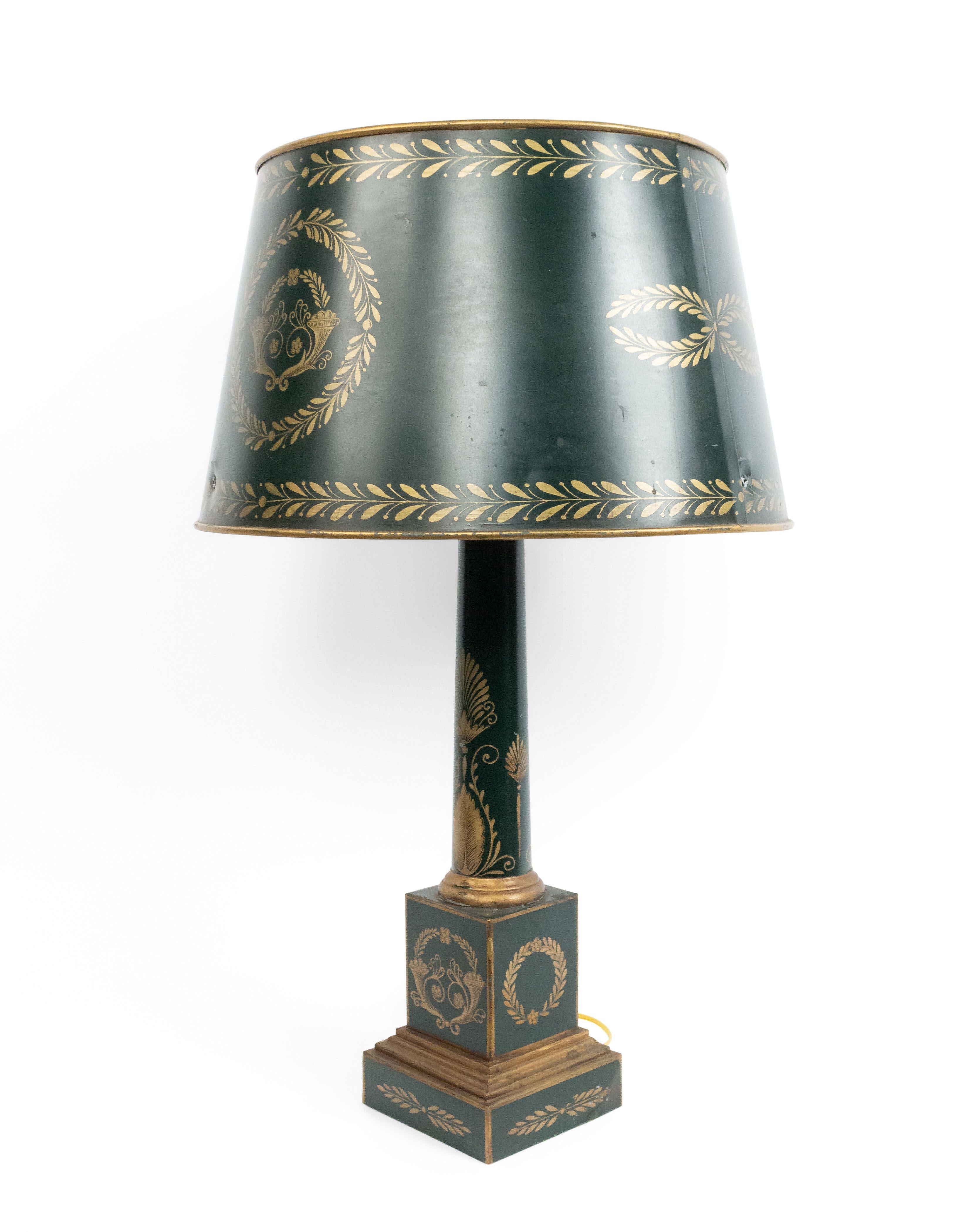 Pair of French Directoire style green tole and gilt decorated column table lamps with decorated shade 20th century.